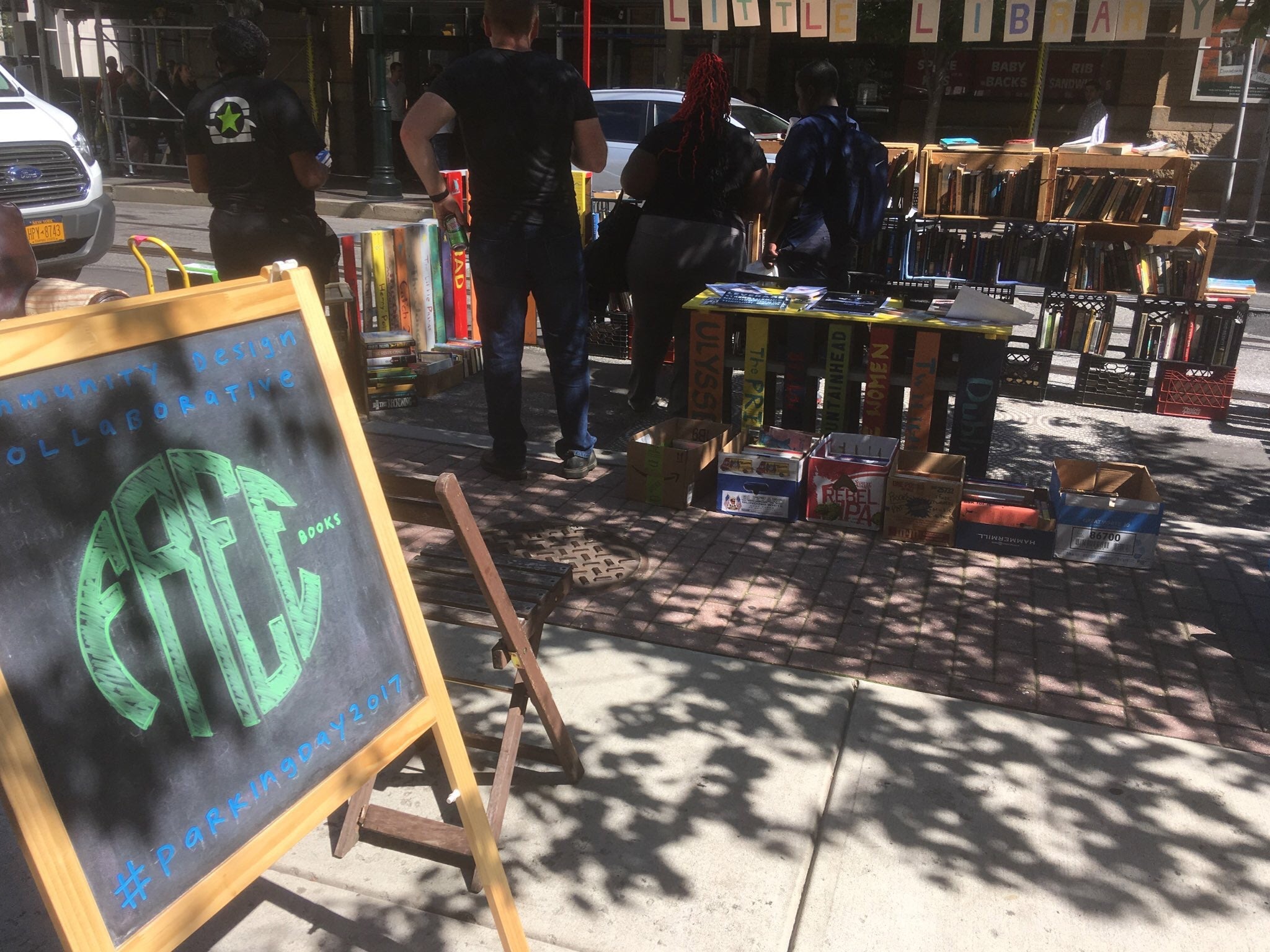 Community Design Collaborative promoted Little Libraries at 12th and Arch, giving away free books