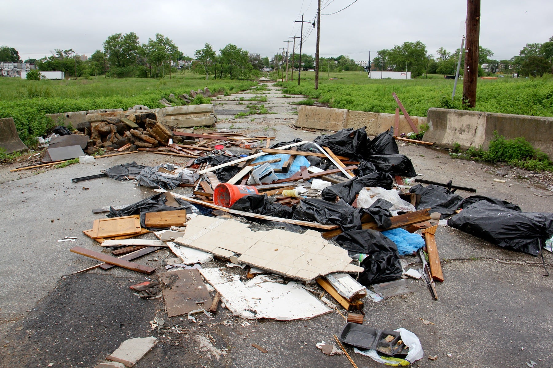 Construction debris illegally dumped at the Logan Triangle in North Philadelphia.