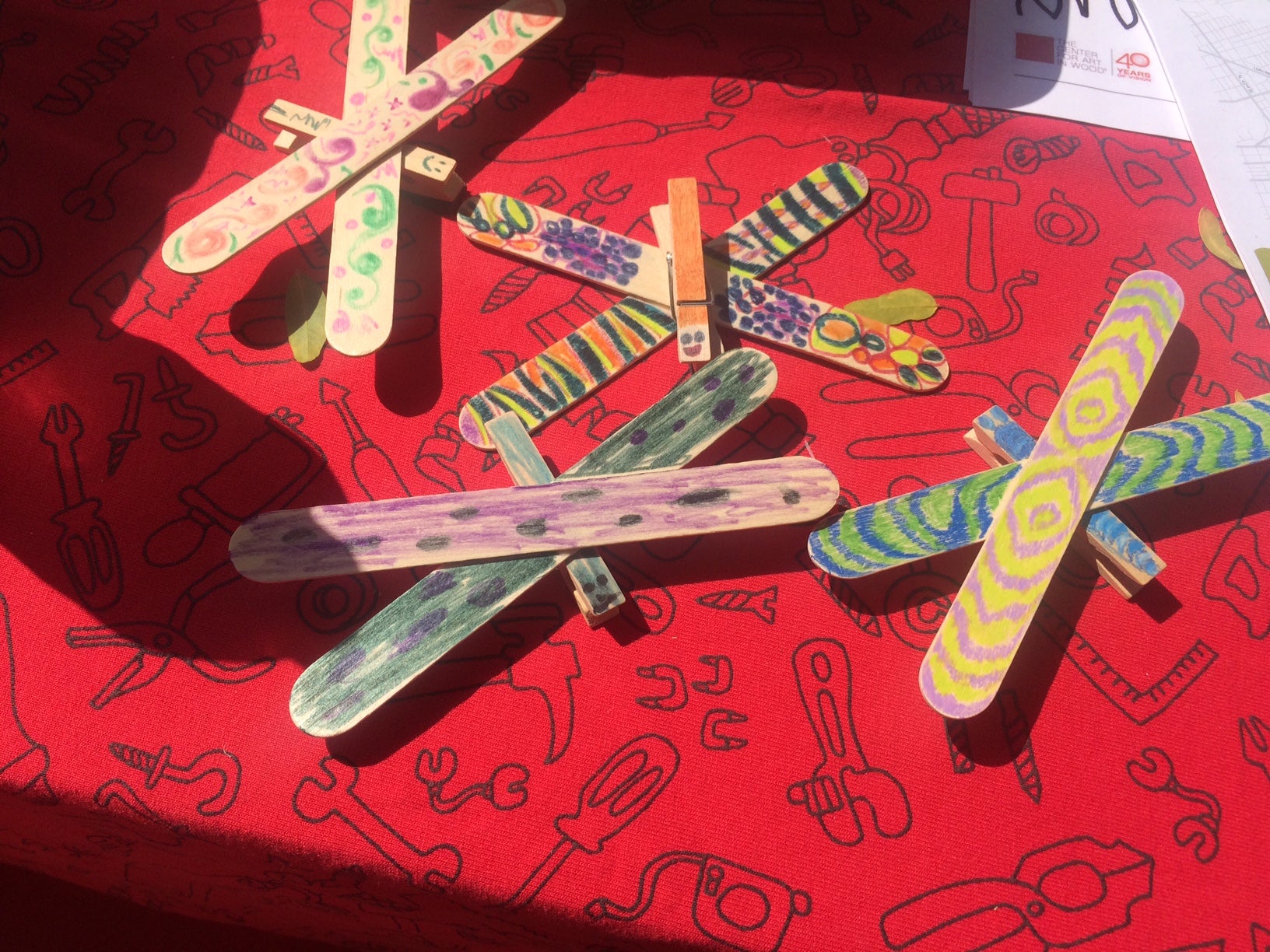 Dragonflies made by kids at the Center for Art in Wood Park(ing) Day pop-up