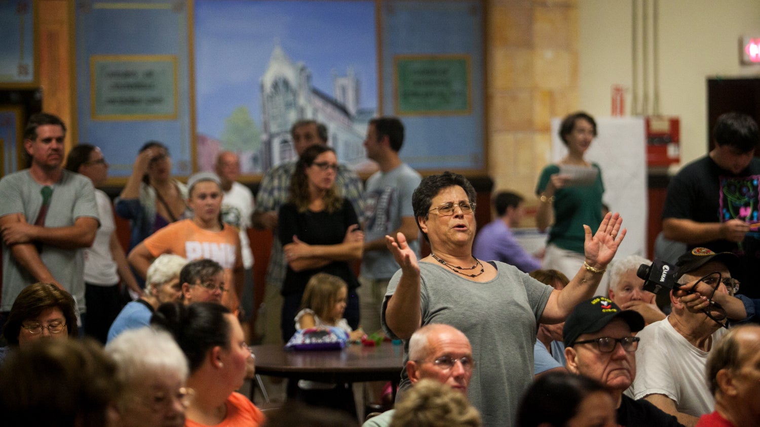 Fishtown residents debate a development project at a neighborhood zoning meeting. 