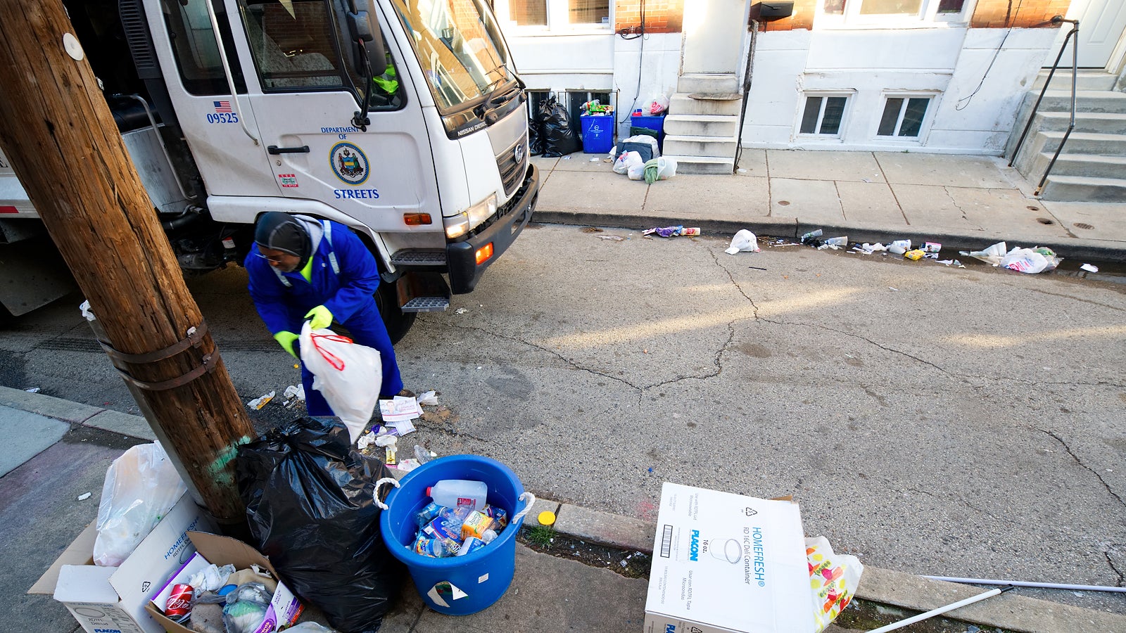 High winds have picked up some of the rubbish and recyclables and blew it into the street. South Philadelphia, PA, on February 13th, 2017. (Bastiaan Slabbers for NewsWorks)
