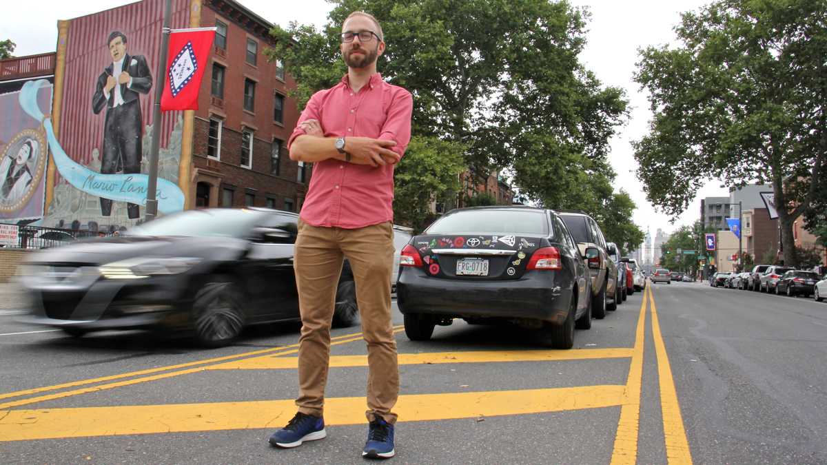 Jake Liefer and his PAC, 5th Square, are suing to stop parking in the median on South Broad Street. (Emma Lee/WHYY)