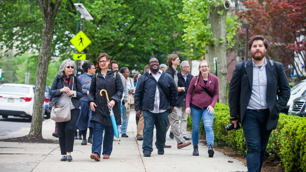 Jane's Walk participants enjoy a guided exploration of Lancaster Avenue during a 2017 walk.