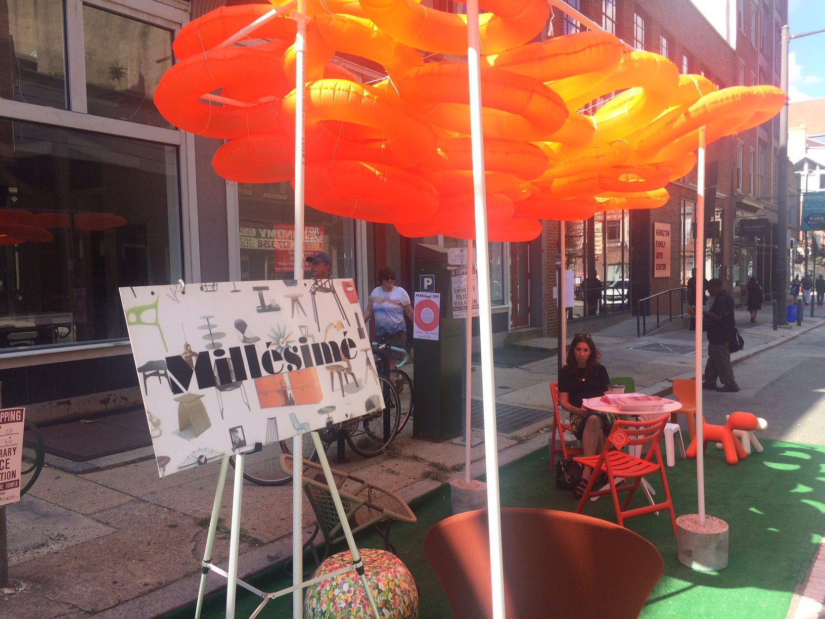  p.p1 {margin: 0.0px 0.0px 0.0px 0.0px; font: 11.0px Calibri} span.s1 {font-kerning: none}   Land Collective and Millesime teamed up for an end of the summer parklet or a surreal site of playful contemplation with pool float tree tops and astro turf. Caryn Feuer sits in the background. 