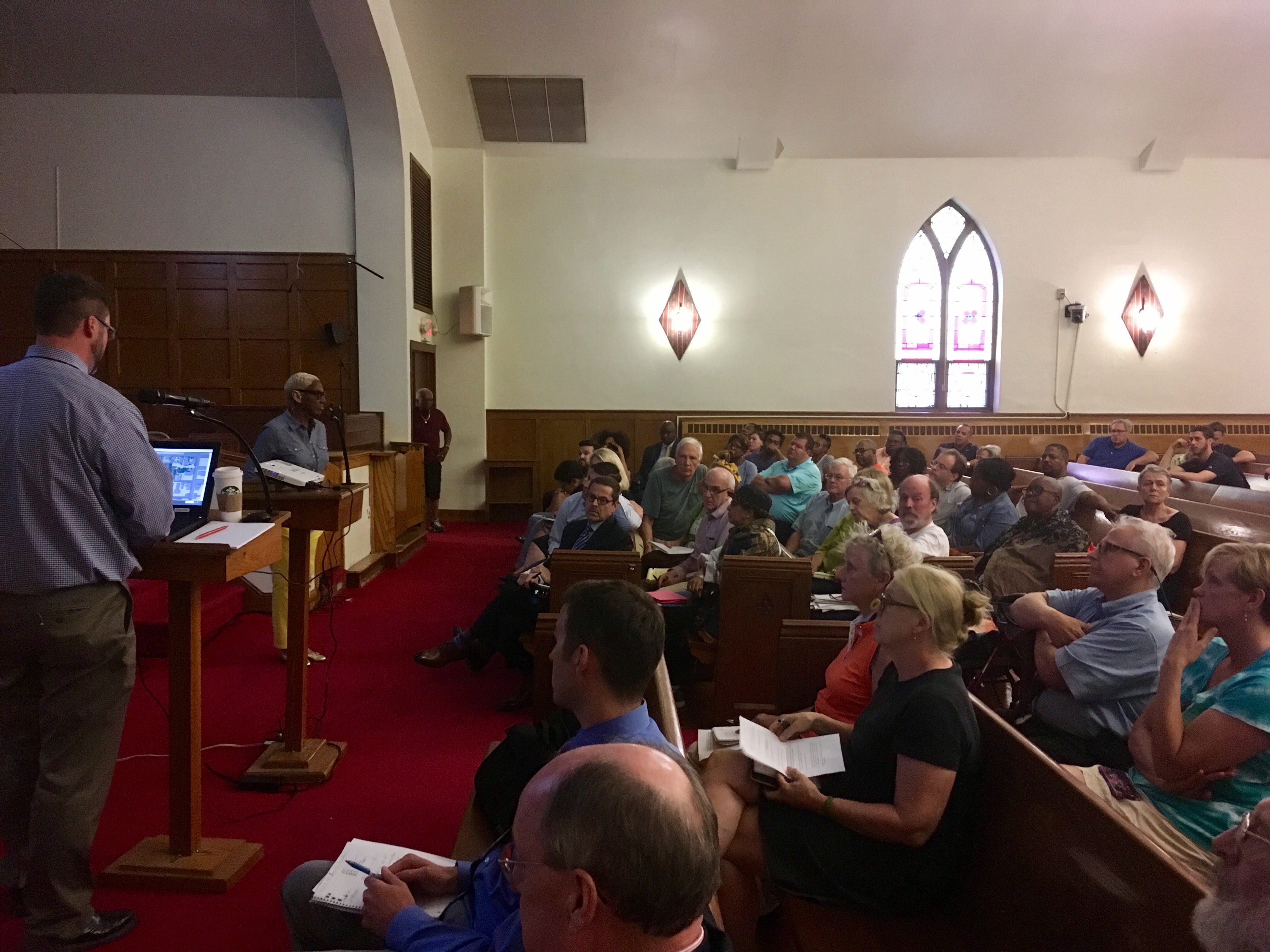 Neighbors gather at Enon Tabernacle Baptist Church Thursday to consider the Boys and Girls Club proposal 