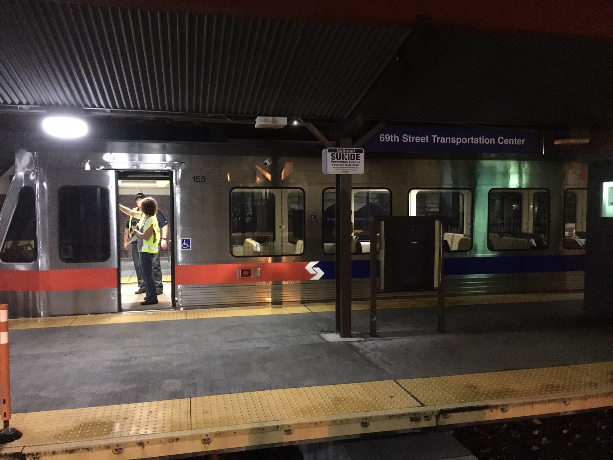 SEPTA accident inspectors look over the NHSL train that crashed into another at 69th Street 