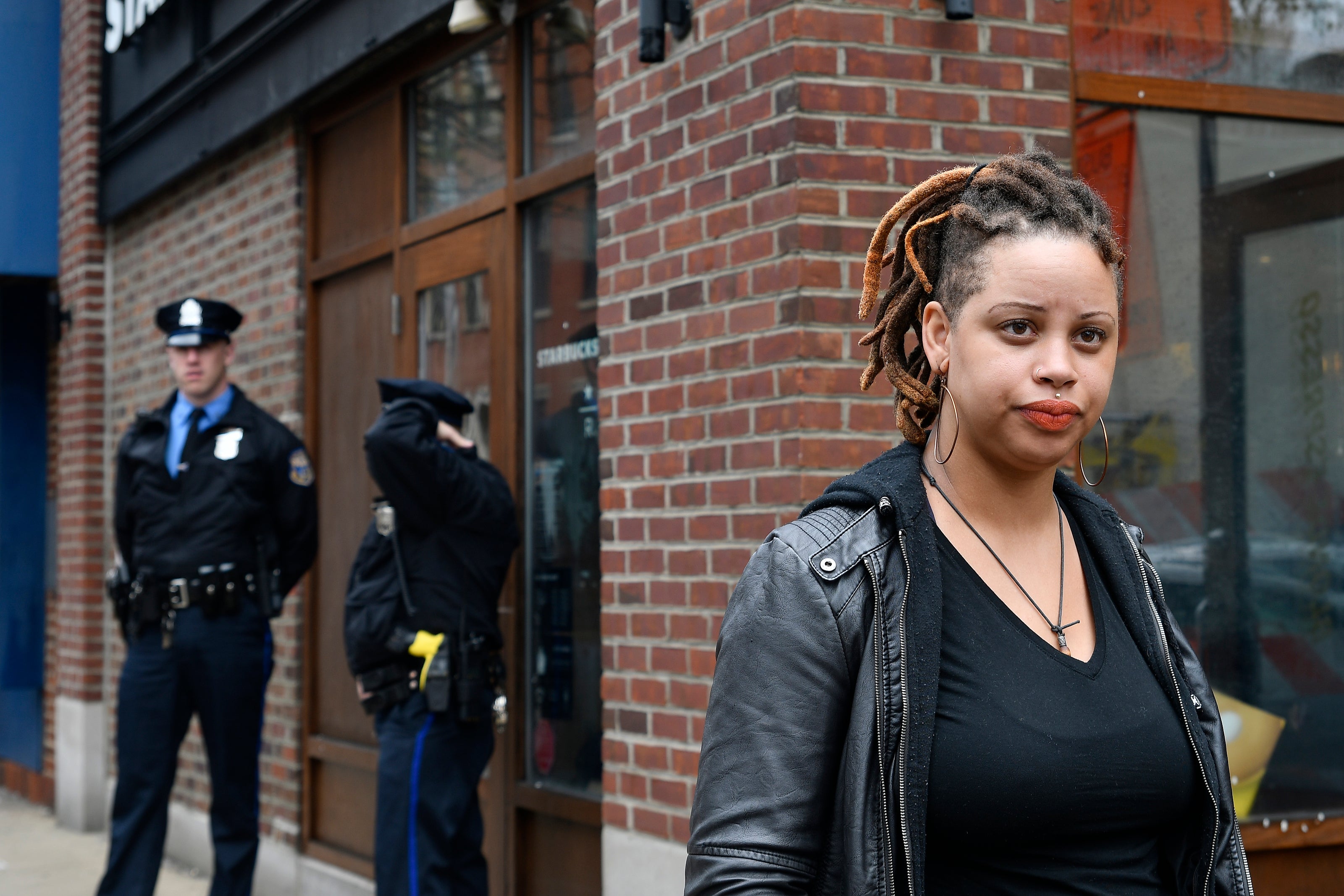 Shani Akilah Robin was one of an estimated 50 people protesting the controversial arrest of two black Starbucks patrons at the chain's Rittenhouse location on April 16. (Bastiaan Slabbers/For WHYY)