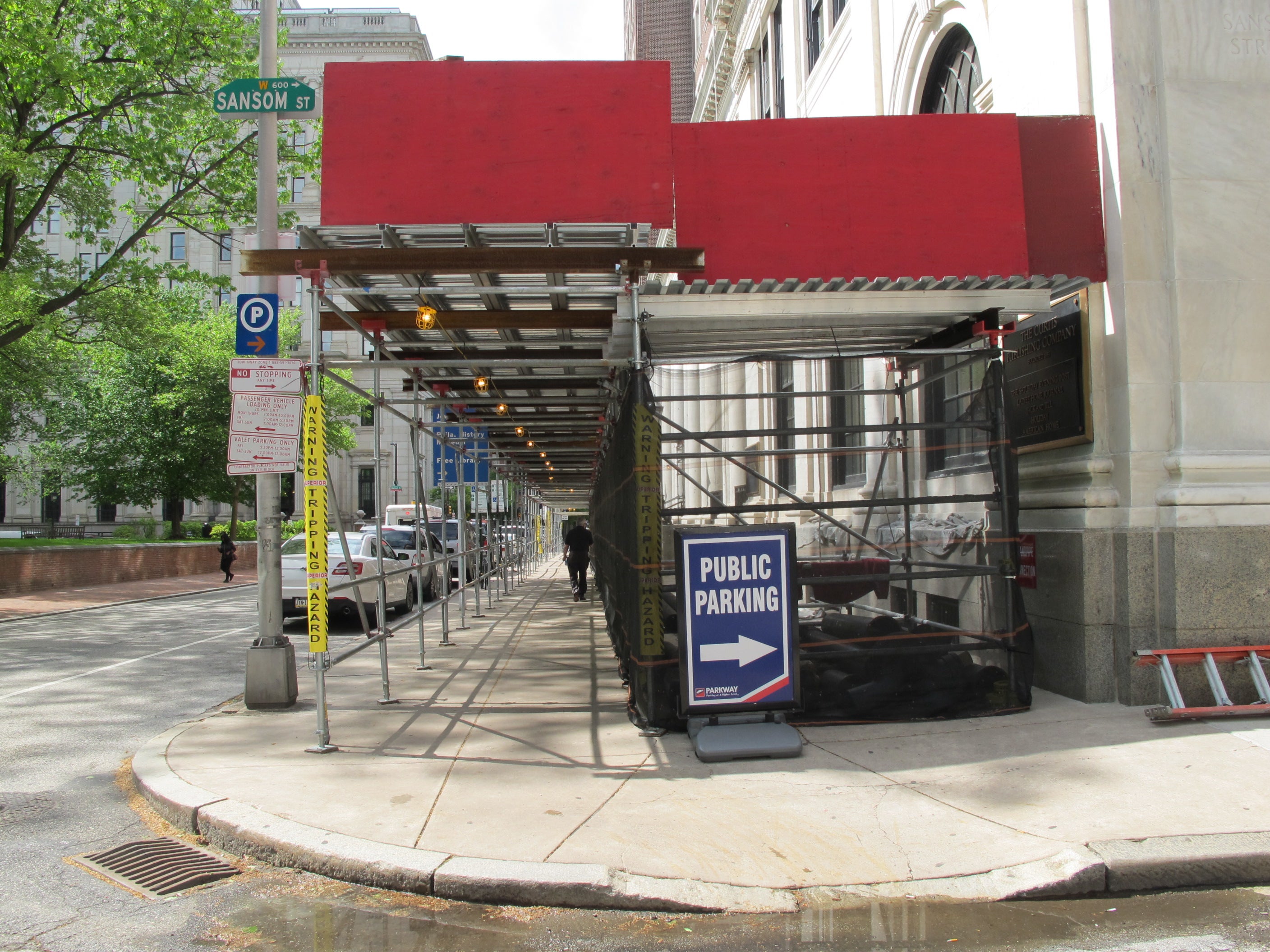 Sidewalk bridging provides pedestrians a covered walkway