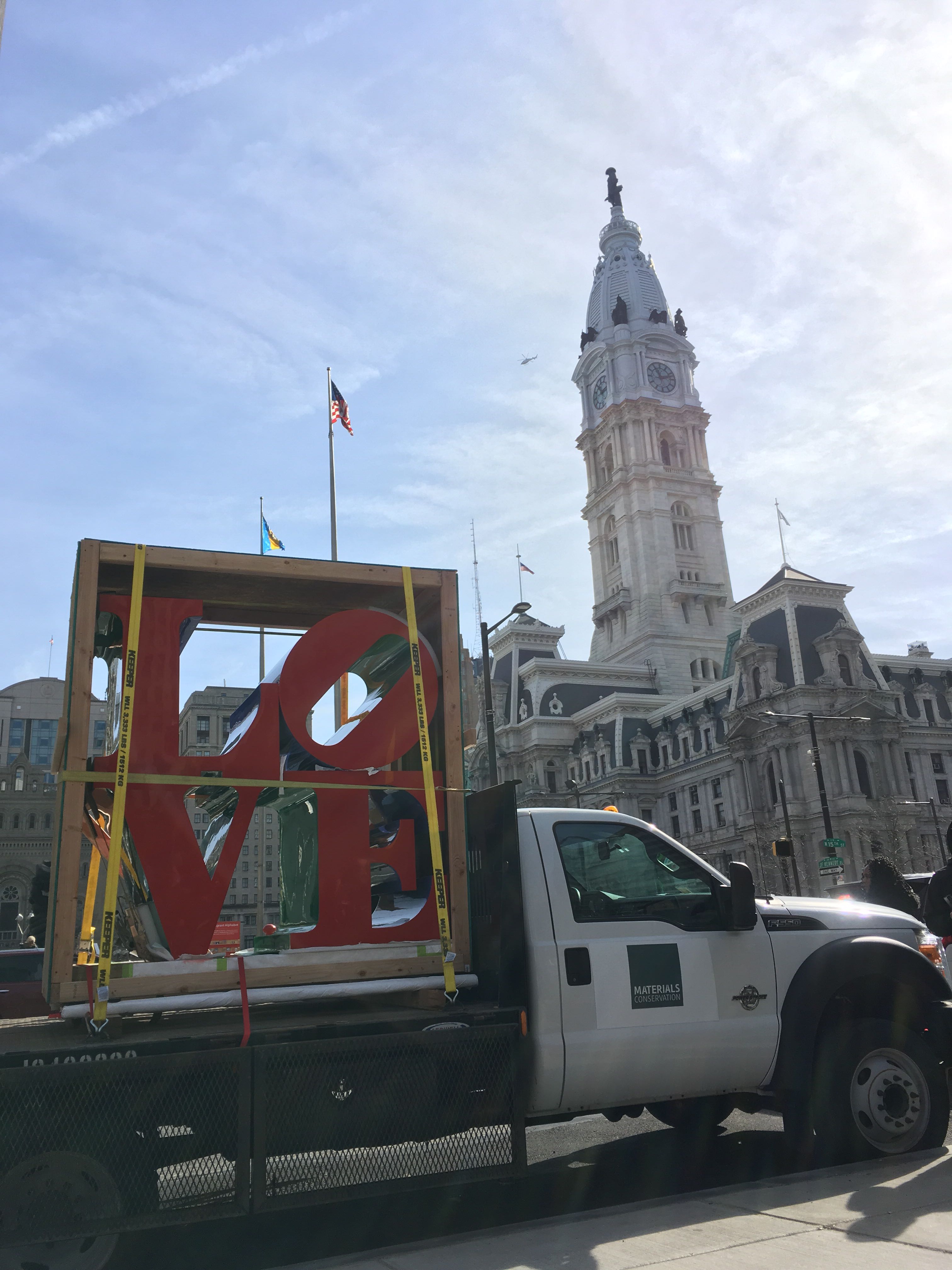The restored LOVE statue makes its way back to LOVE Park. 