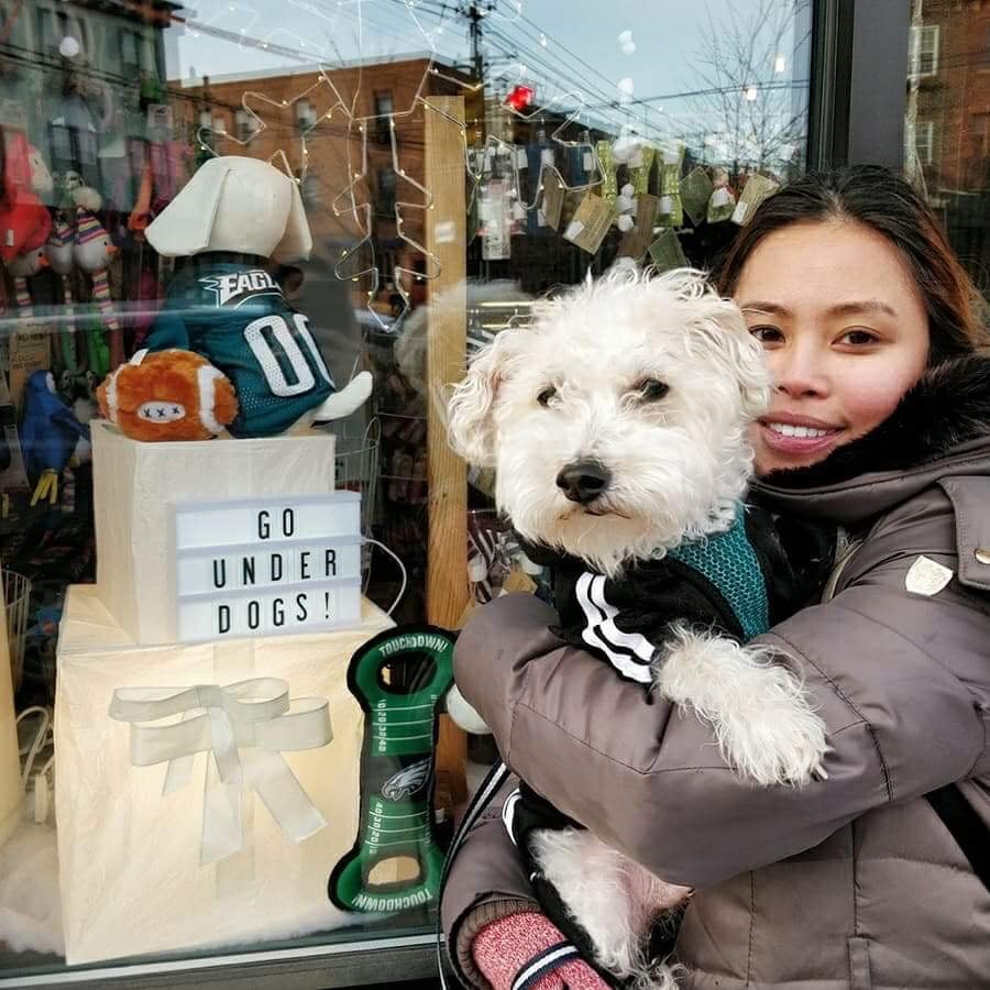 Tobi is glad he wore the right colors today for the Eages Puppy Bowl Parade. 