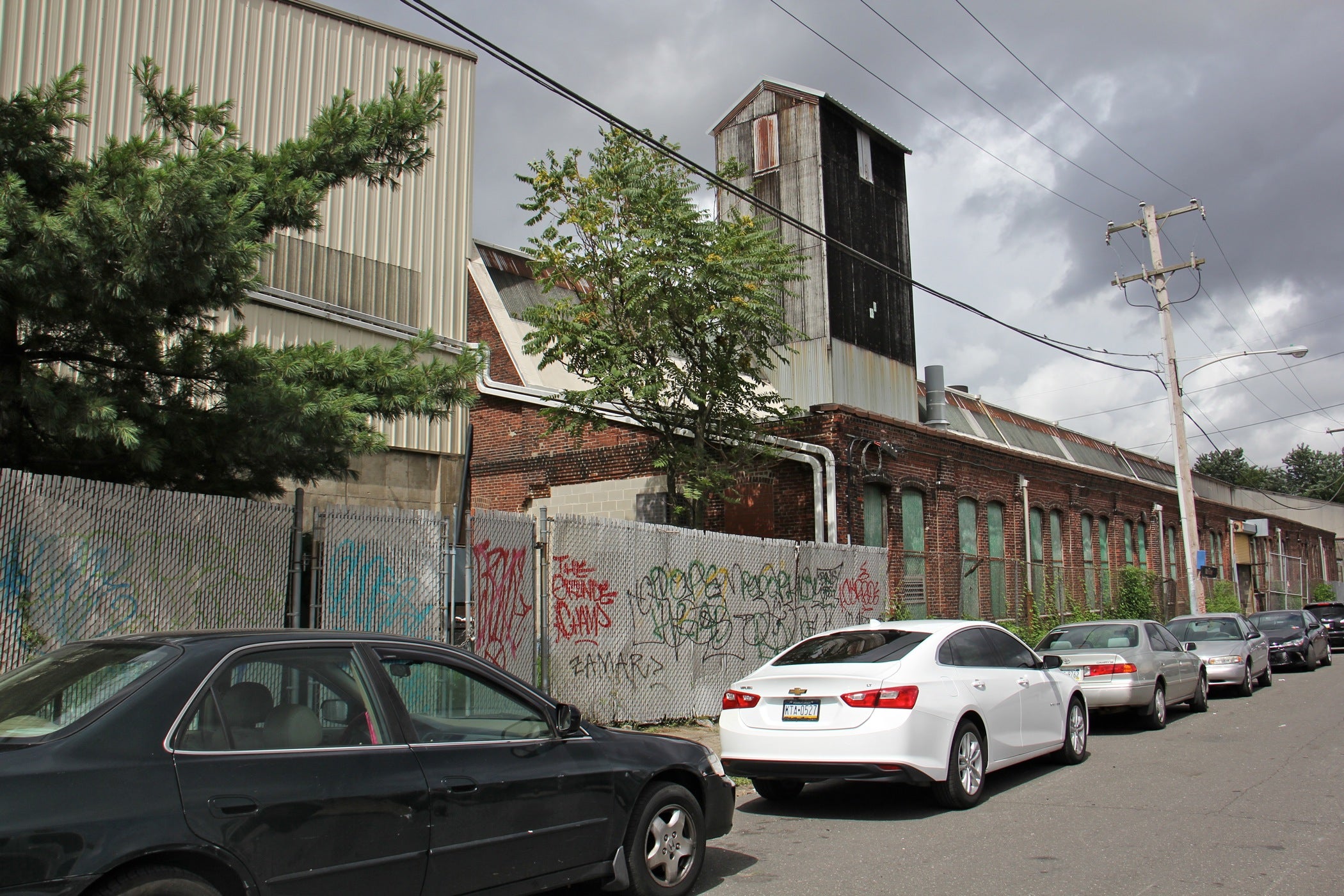 Adella Bond’s house in the 2900 block of Ellsworth Street is long gone. The little neighborhood is now a graffiti-spattered industrial area. | Emma Lee/WHYY 