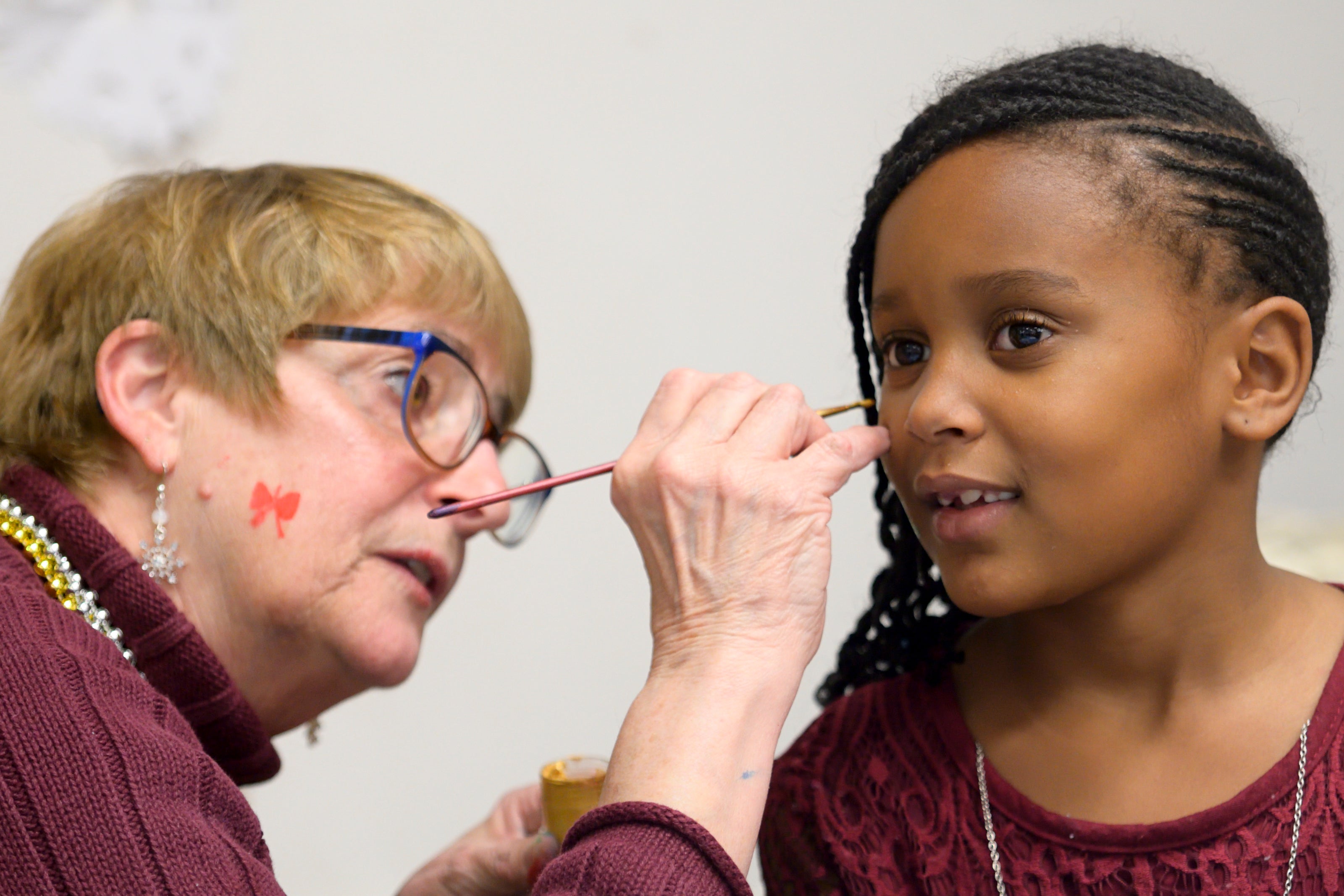 Facepainting the Annual Winter Festival in Olney. Bas Slabbers/WHYY.