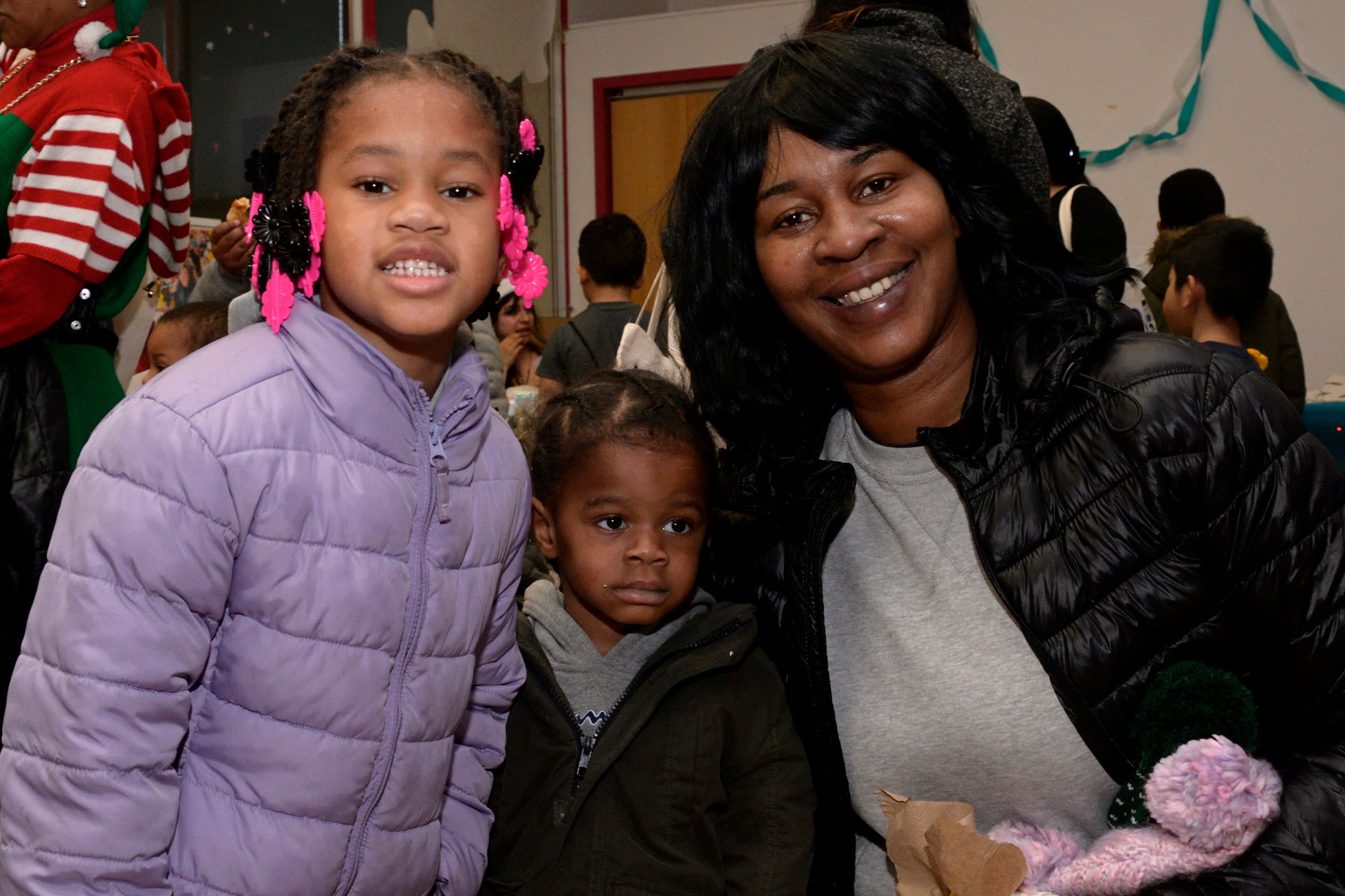 Iris Caple with her family at the Annual Winter Festival in Olney. Bas Slabbers/WHYY.