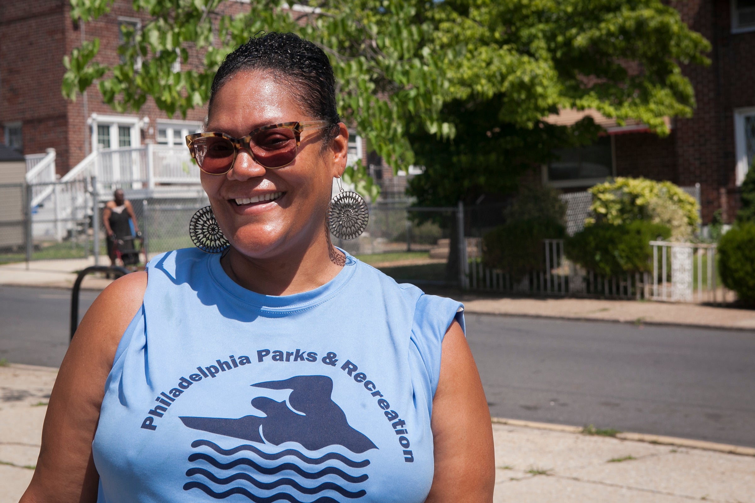 Dendy pool maintenance associate Joanne Williams-Campbell walks towards the pool on Friday, June 29, 2018. She runs a tight ship, with her strict rules about no towels or shoes on the pool deck and requiring all swimmers to shower before and after going into the water. 