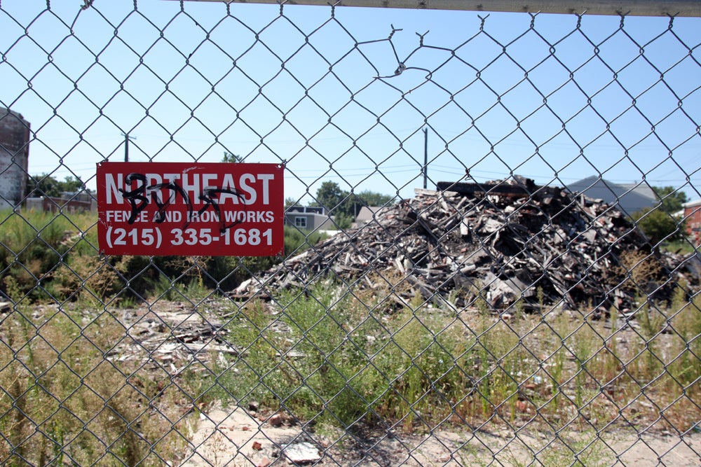 Scrap metal and debris is dumped in an abandoned lot near 6th and Germantown in the APM neighborhood.