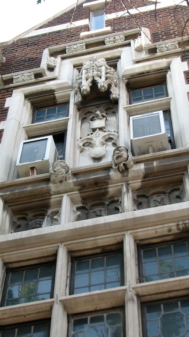 The adjacent school building also has beautiful architectural details.