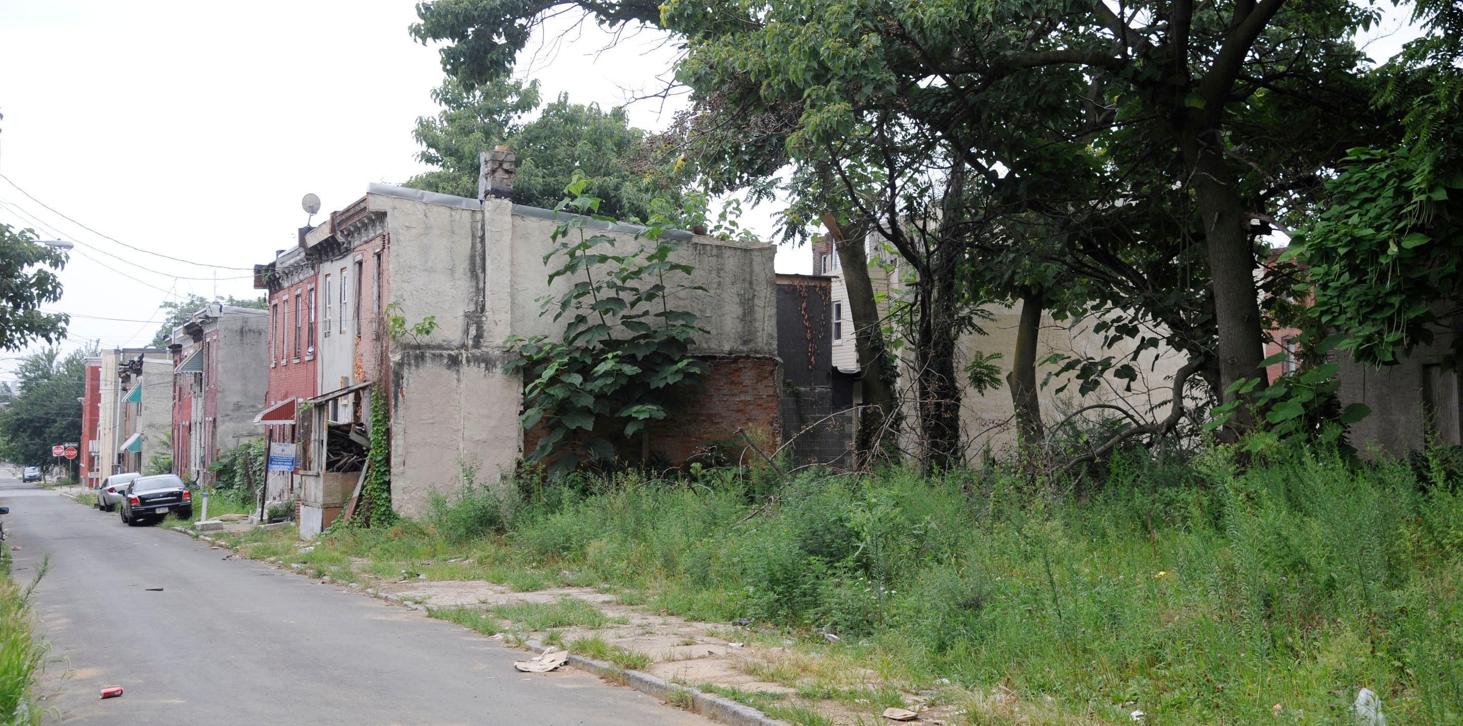 Empty, tax delinquent lots near a major new transit oriented development in eastern North Philadelphia. (Clem Murray / Inquirer)