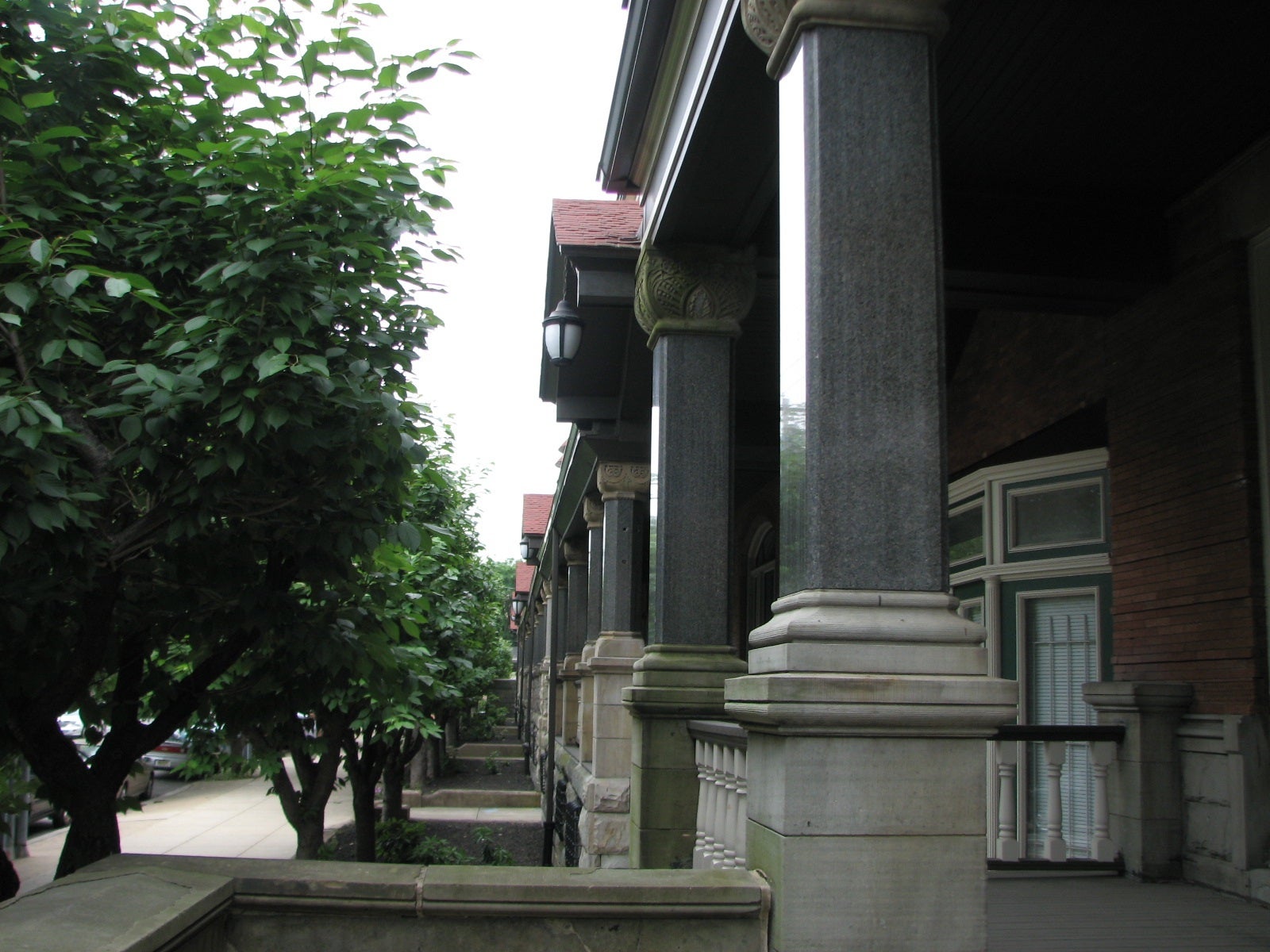 Smooth columns and porches welcome visitors to the apartment buildings.