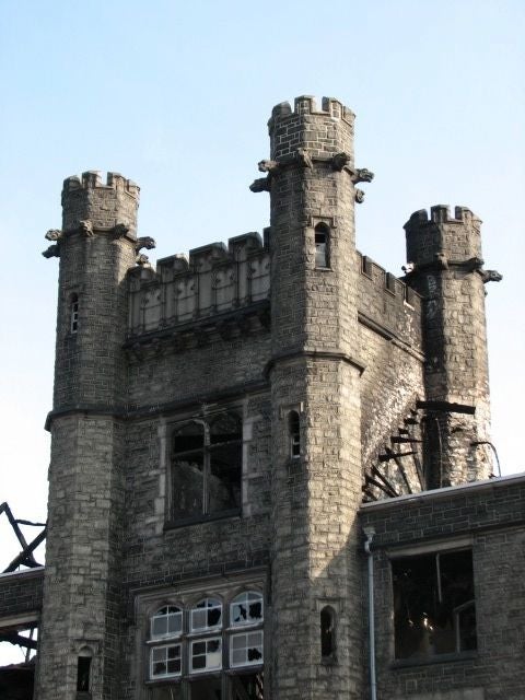 The building's distinctive turret survived more than a century of change.