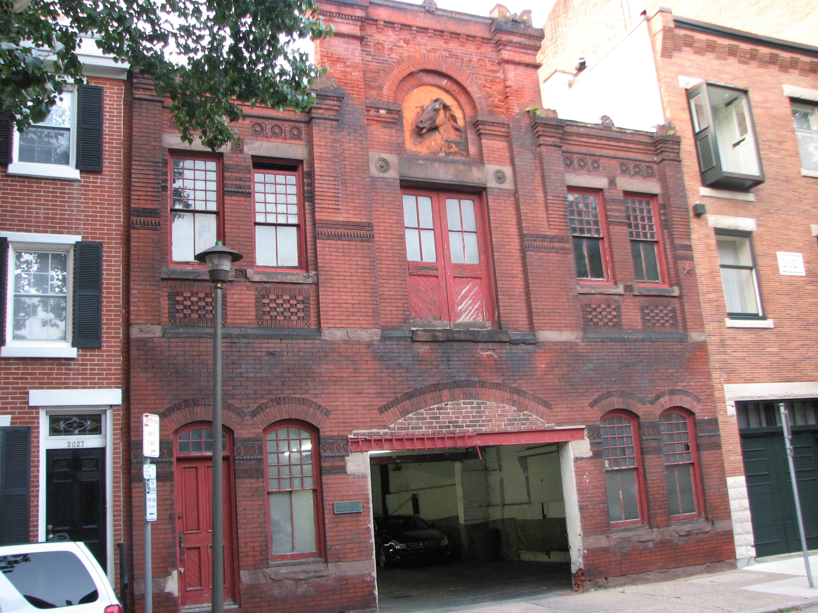 The beautiful former stable and carriage house at 2023-2025 Rittenhouse is now a garage.