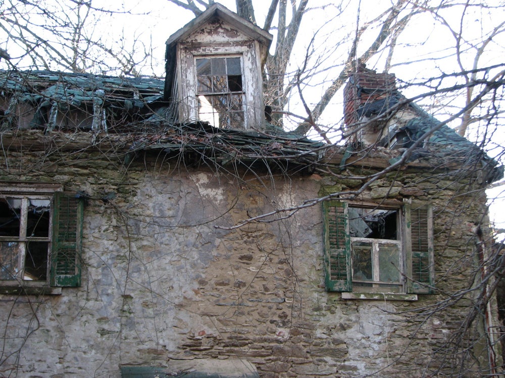 Portions of the roof on the old stone section have collapsed.