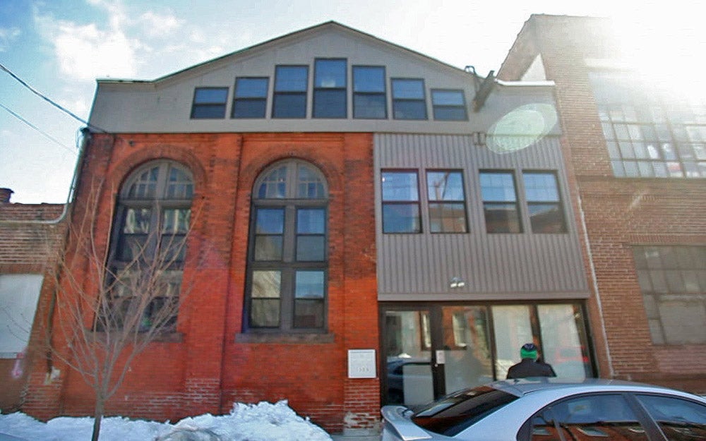 The facade of the Maas building, which is a mixed use facility that houses office space and a rental facility for events.