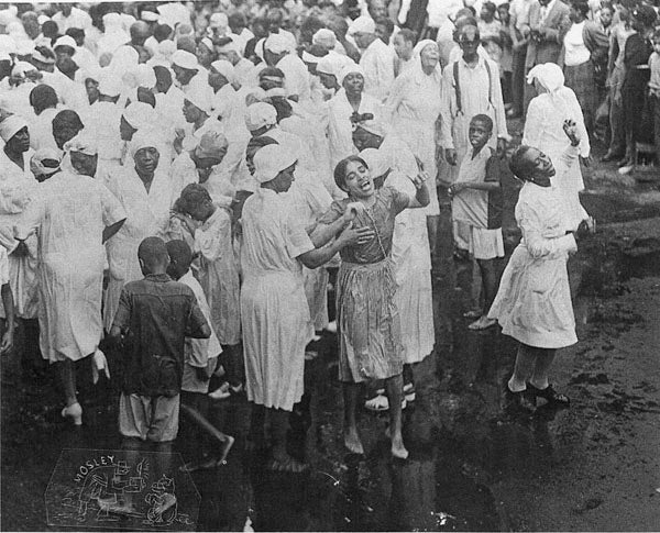 A mass baptism at 16th in Christian in 1946. Photo by John W. Mosley