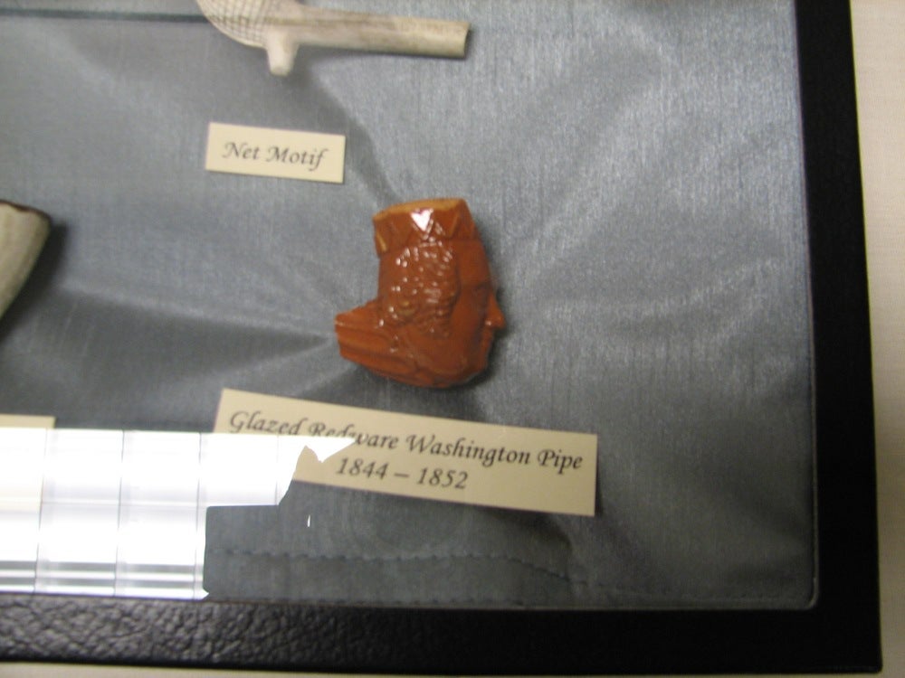 The bowl of a redware pipe - in the shape of George Washington's head