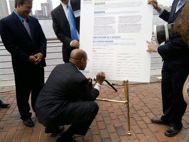 Mayor Nutter signs proclamation of the plan, Connections - the Regional Plan for a Sustainable Future. All speakers signed it.