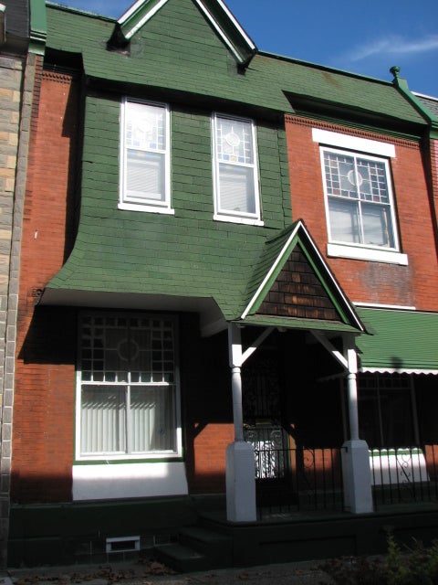  This home has retained many of its original Queen Anne features, including the gabled porch and roof.