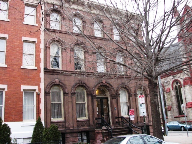 The recently renovated brownstone on the 1900 block is attributed to the Wilson Brothers.