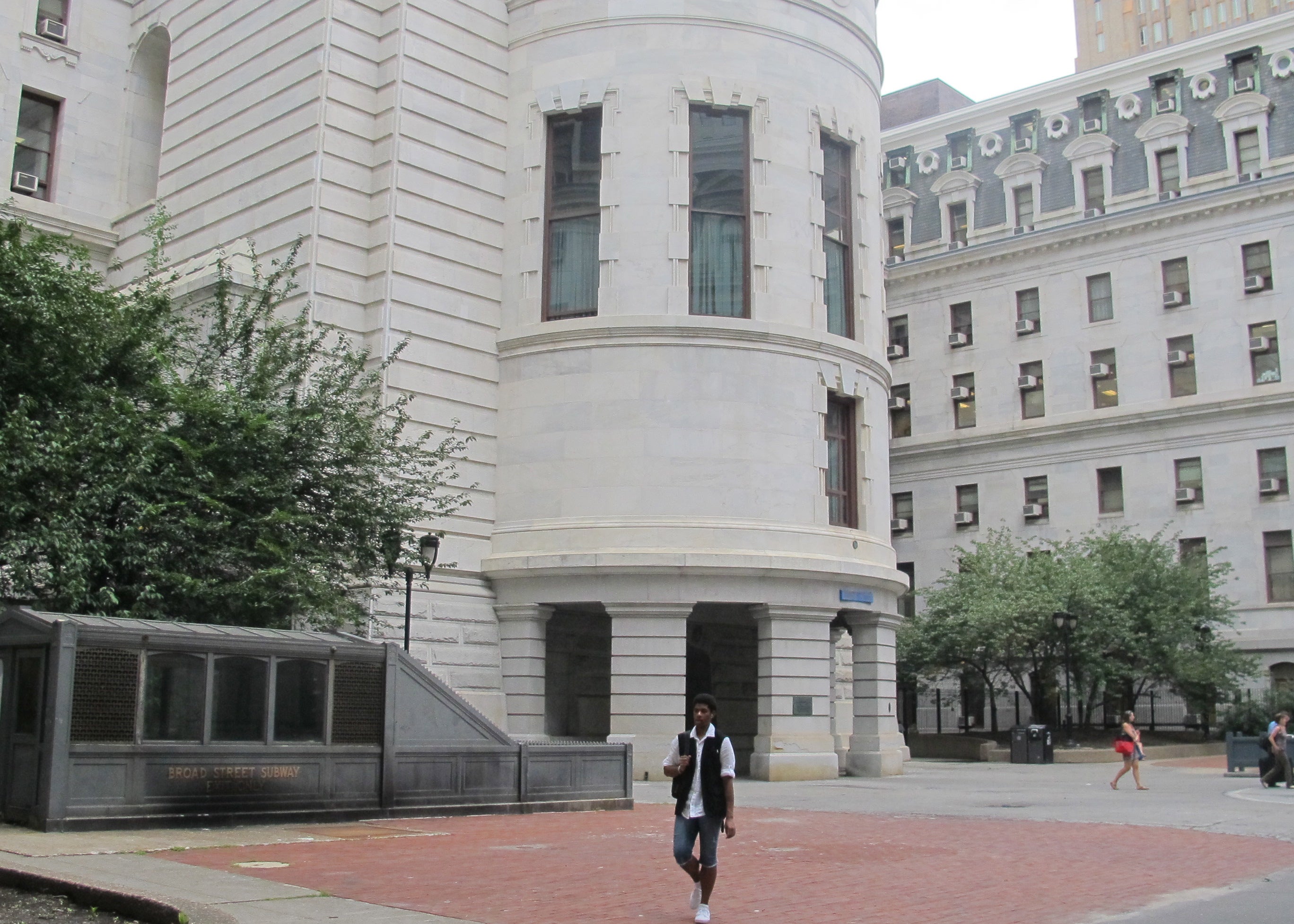 Are we the sculptures in City Hall's courtyard?