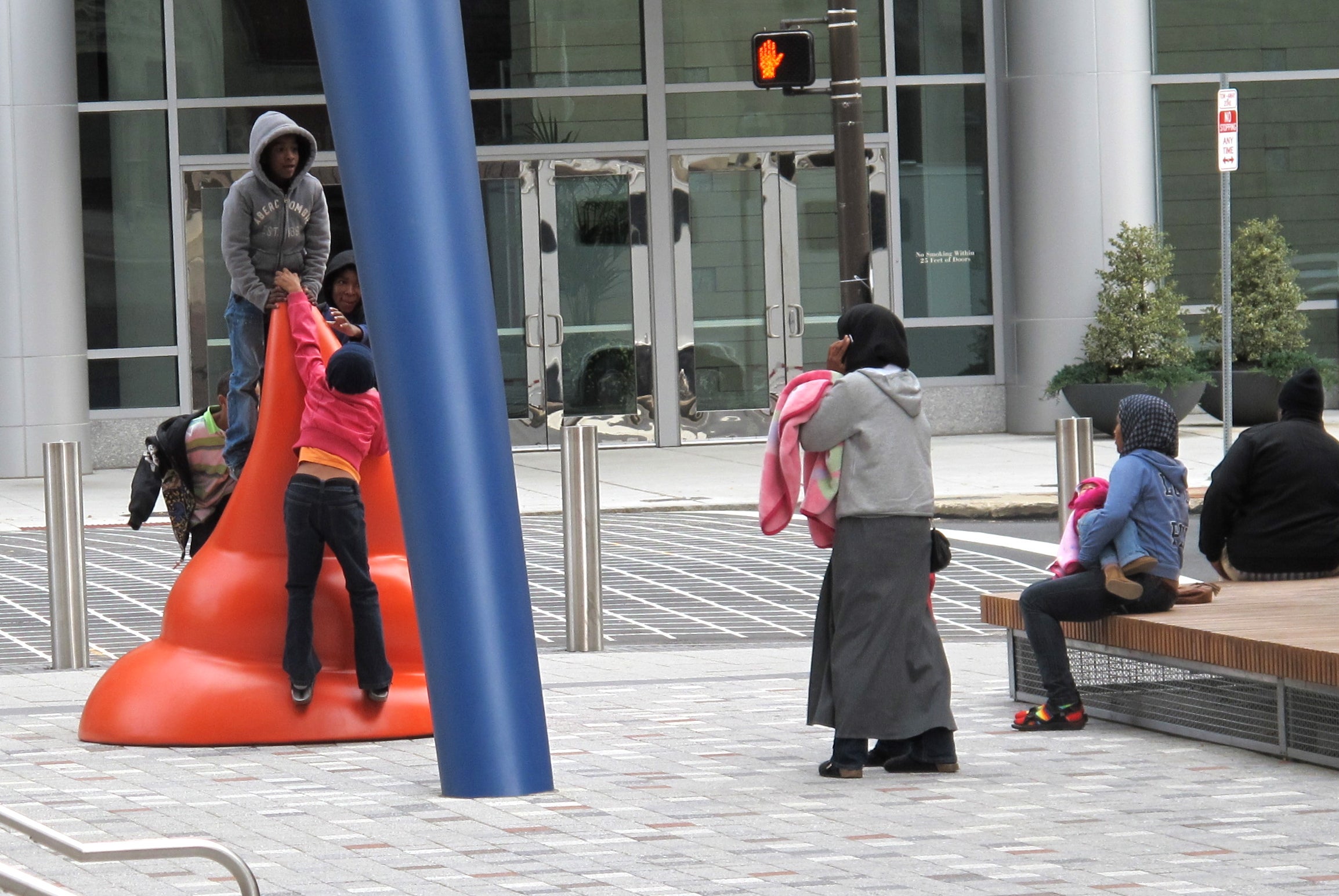 Kids climbing on the paint globule in Lenfest Plaza at PAFA, ignoring their mother.