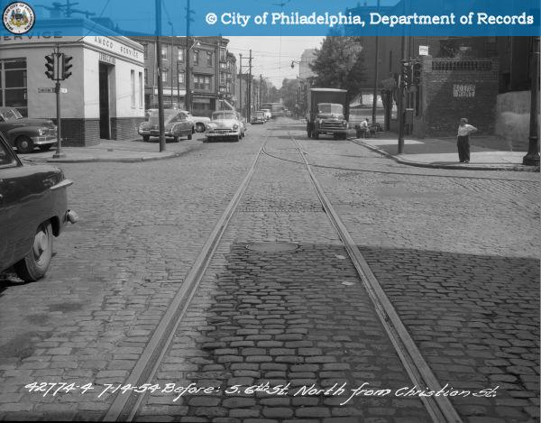 A view down Sixth Street in 1954, with the corner of Hight's Amoco Station at left. | Department of Records Archives, PhillyHistory.org