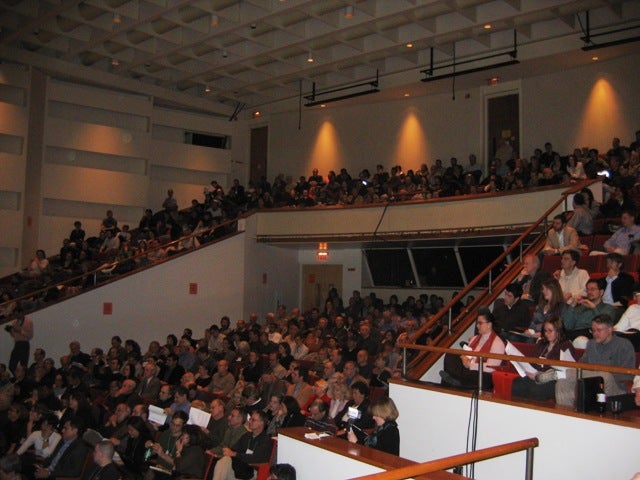 The audience hears the presentations