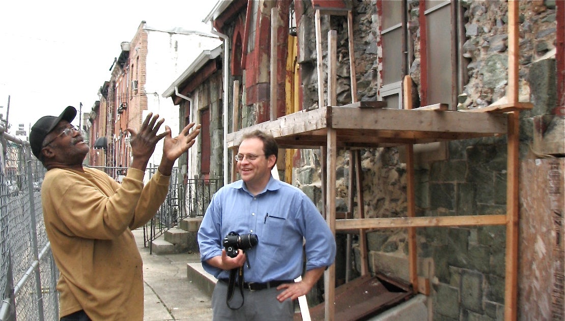  Aaron Wunsch standing in front of 19th Street Baptist Church 