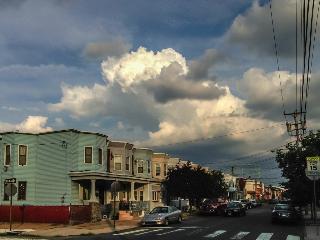 clouds over rowhouses
