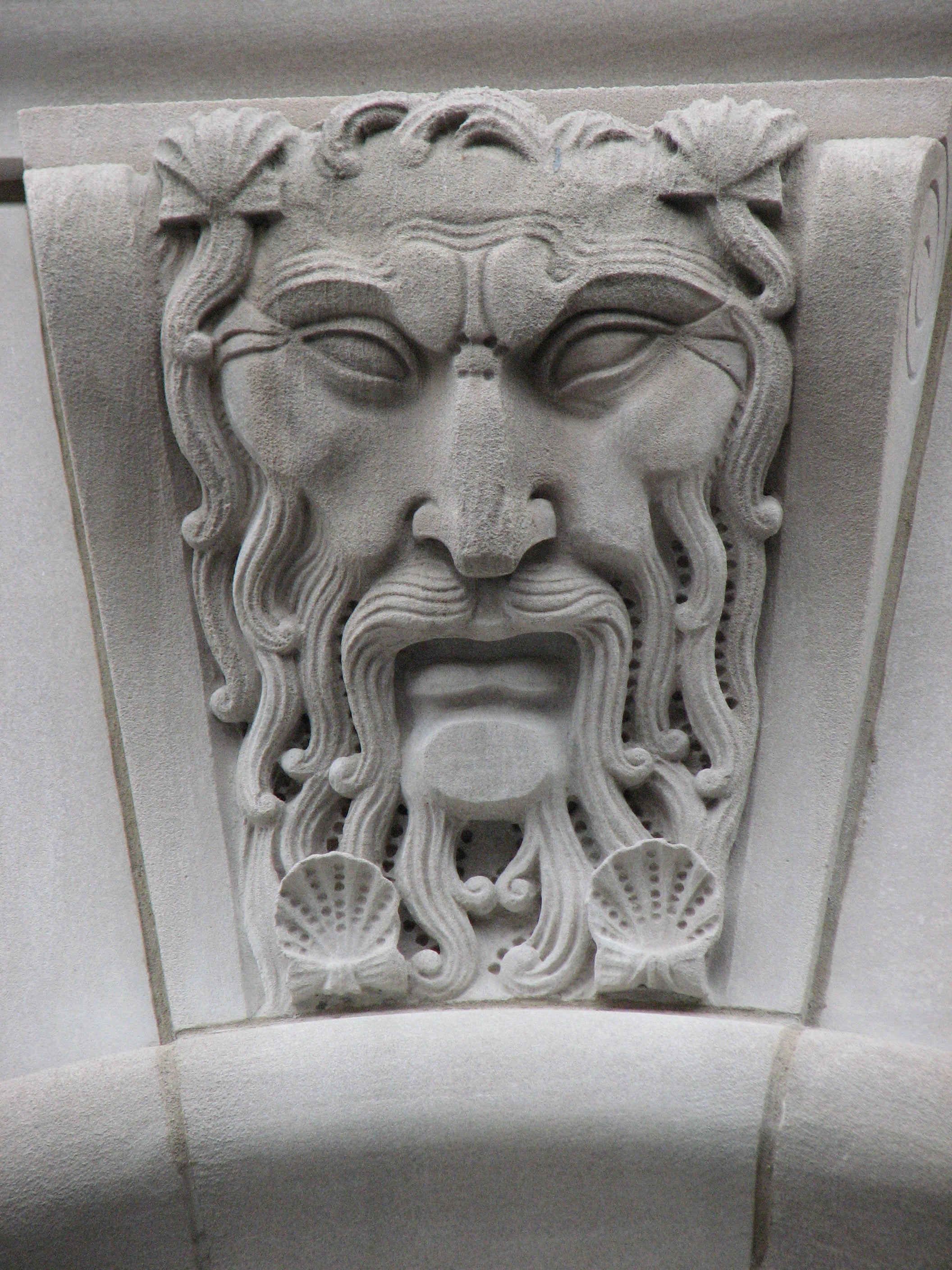 Neptune watches over comings and goings at the Custom House.