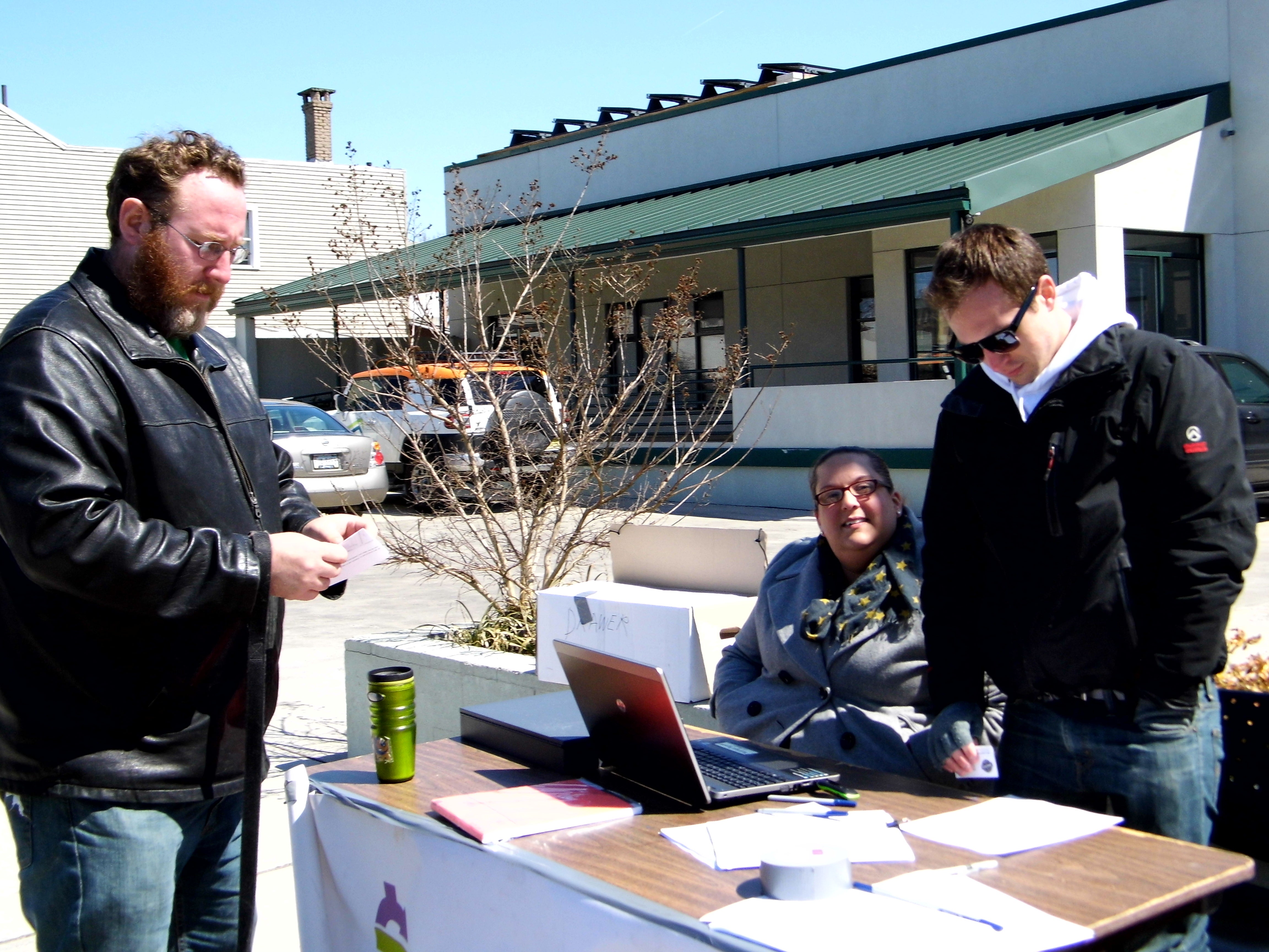 Equal Dollars staff explained the program to the community at 2nd and Thompson streets Saturday afternoon.