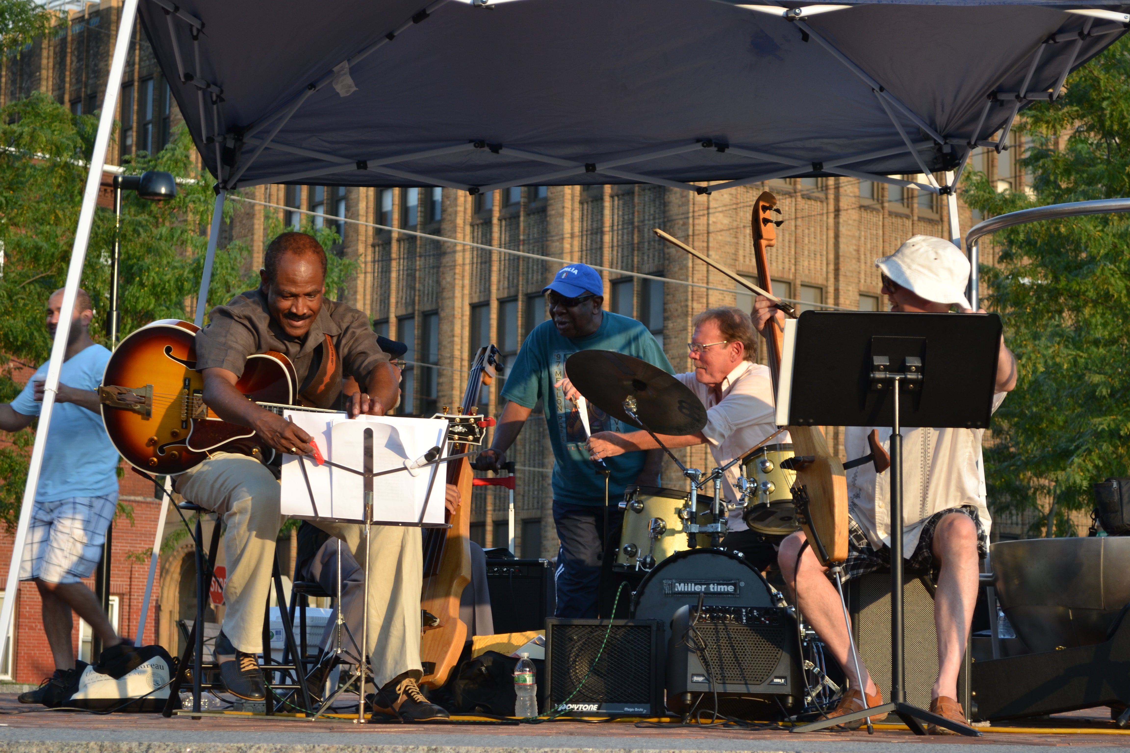 Hawthorne Park neighbor and jazz legend Mickey Roker, center, came to tease the band between songs 