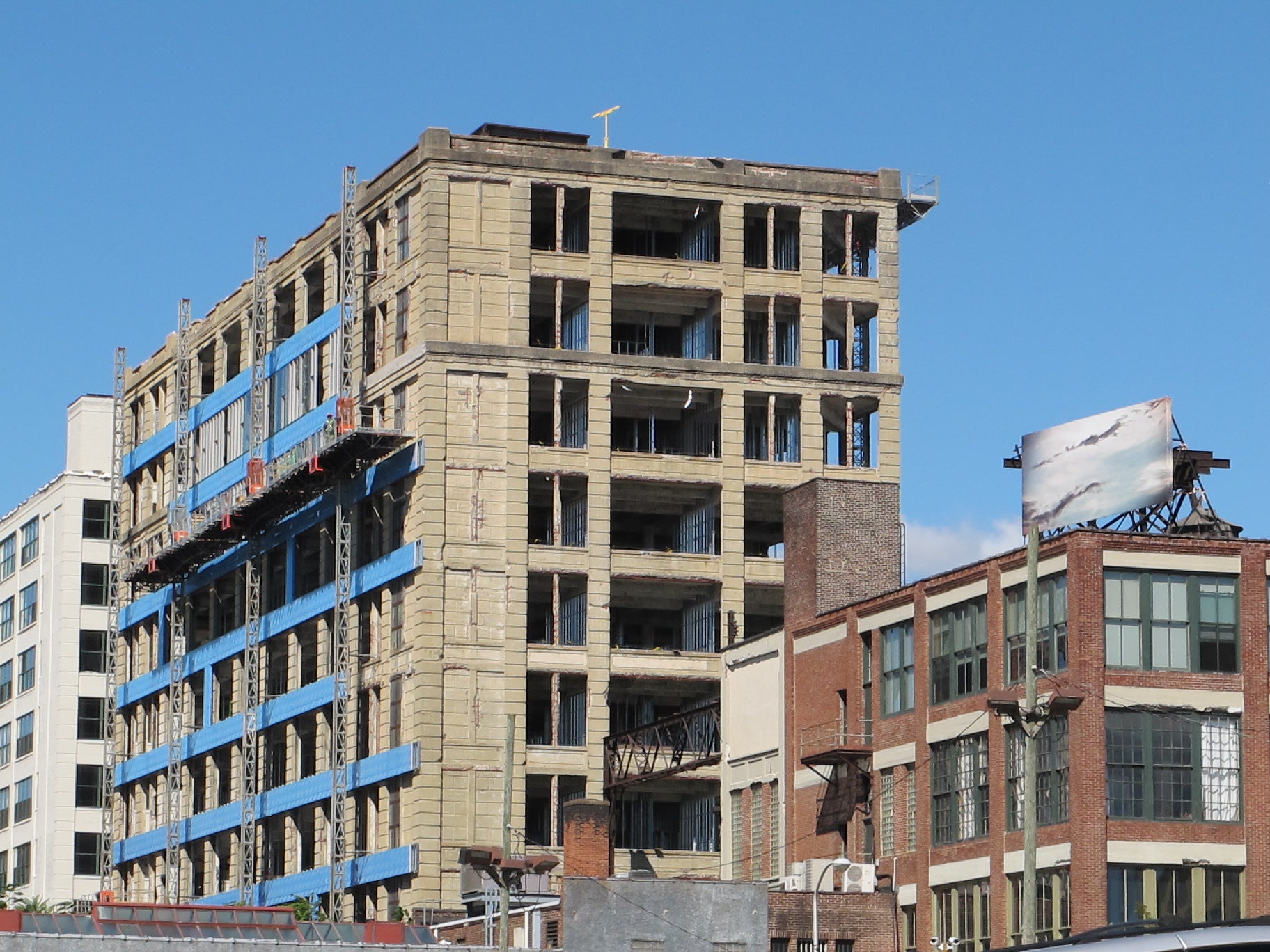 The ongoing (if behind schedule) conversion of the former Goldtex factory into lofts.