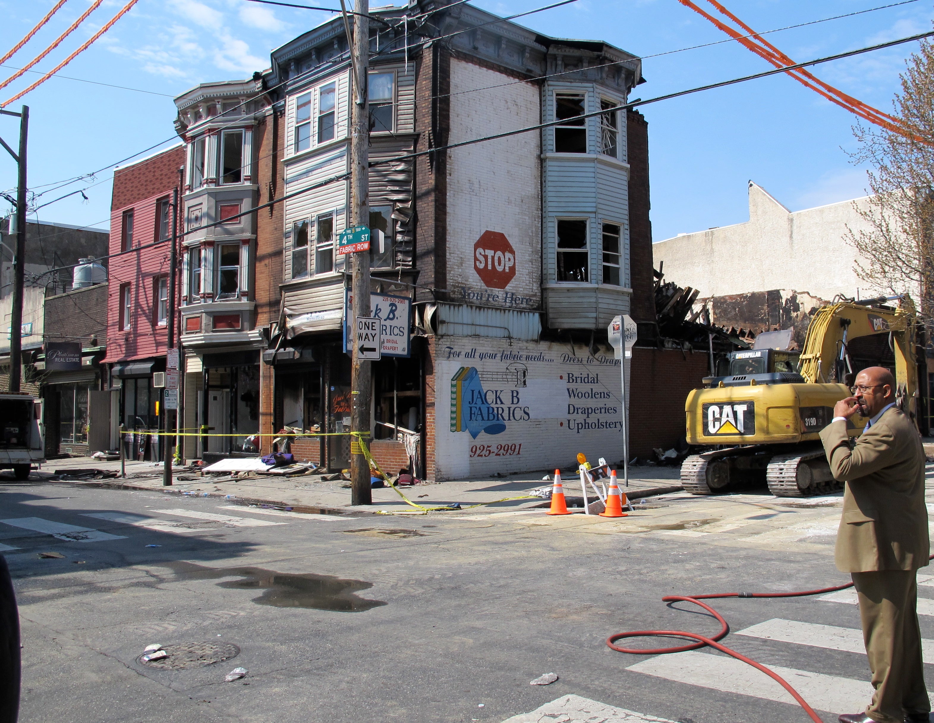 Mayor Nutter observing the scene of the Fabric Row fire. Monday, April 8