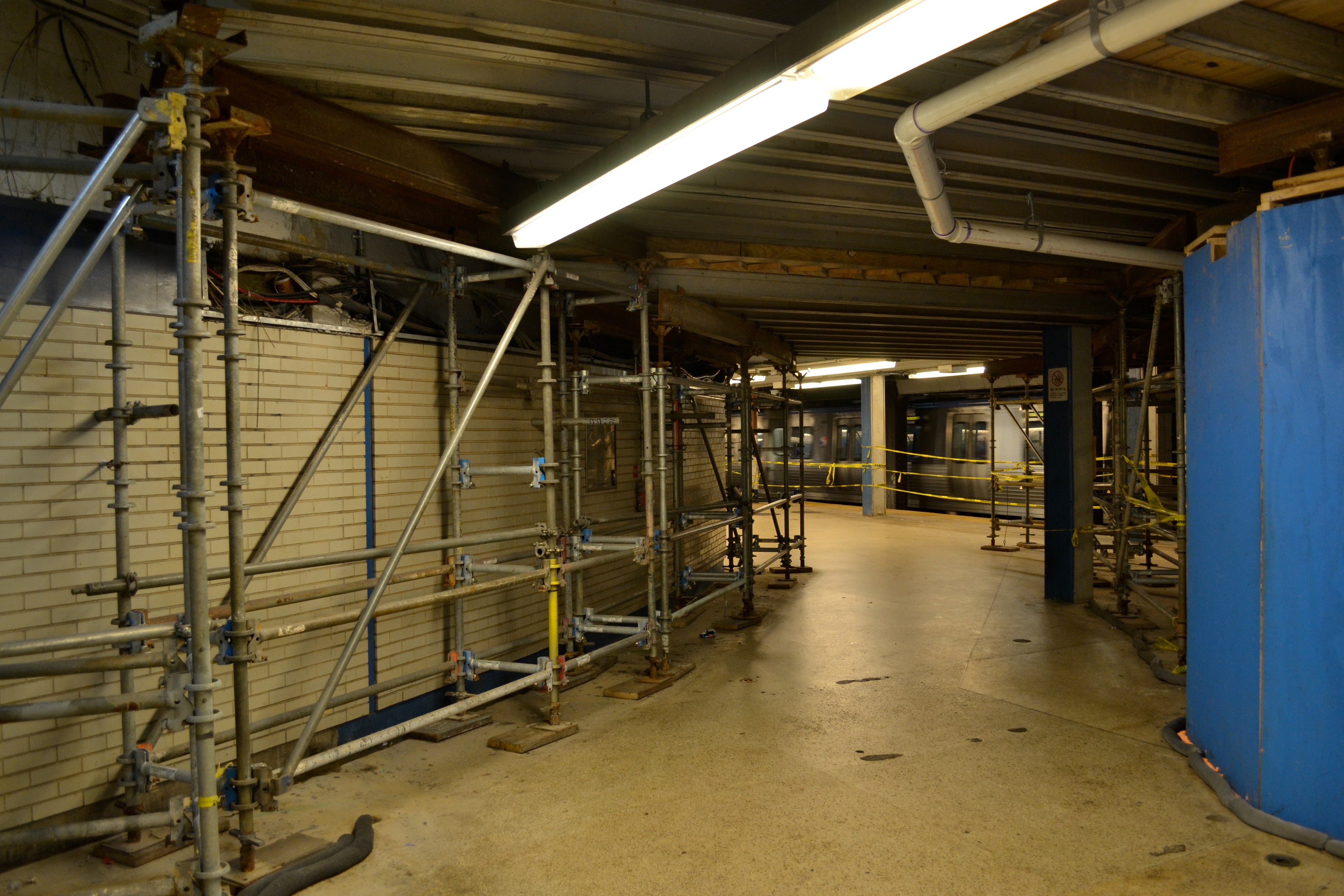 Scaffolding and temporary walls block portions of the MFL platform at 15th Street Station