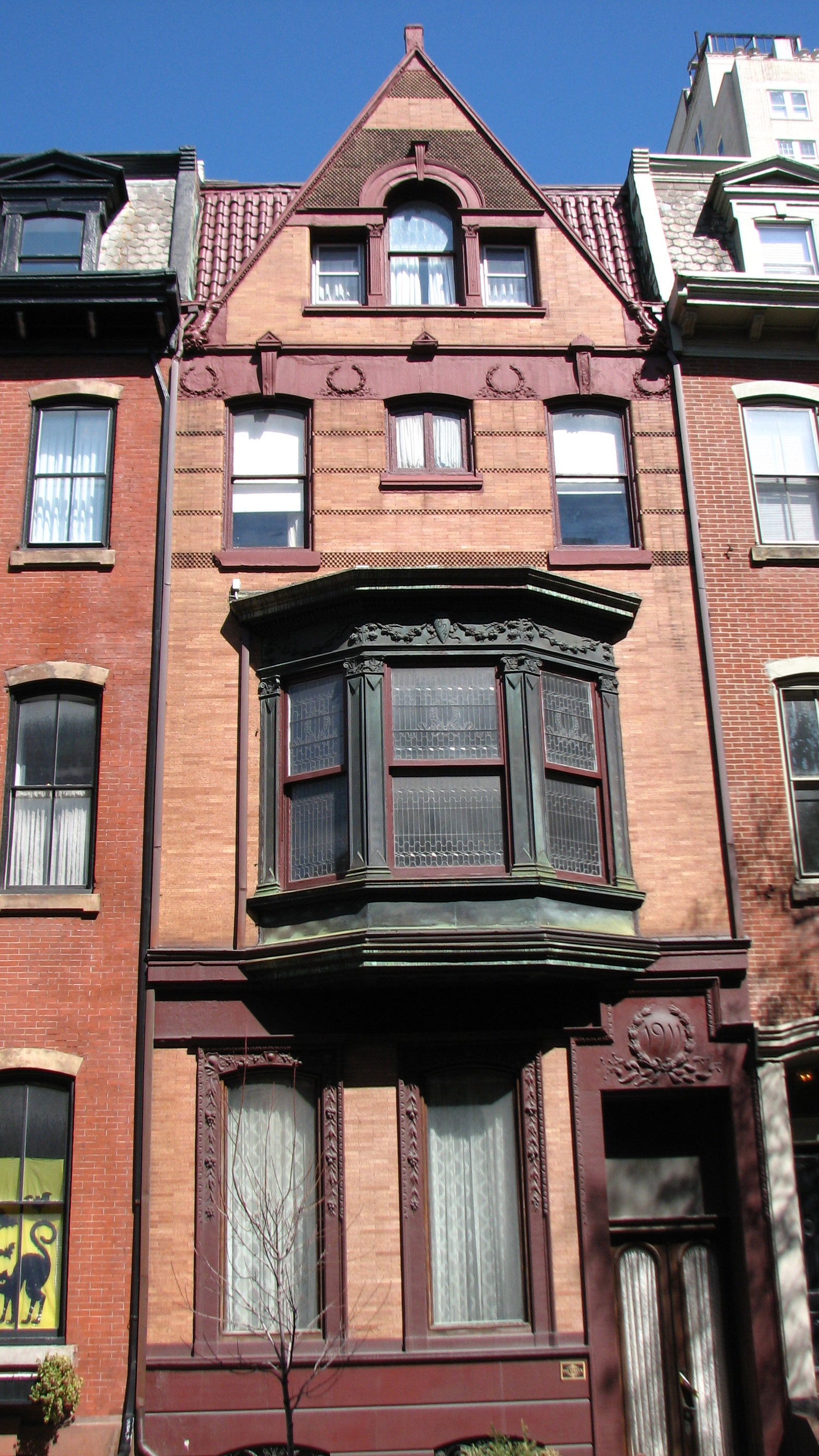 The house at 1911 Spruce combines many of the best features of the neighboring, late-19th century designs.