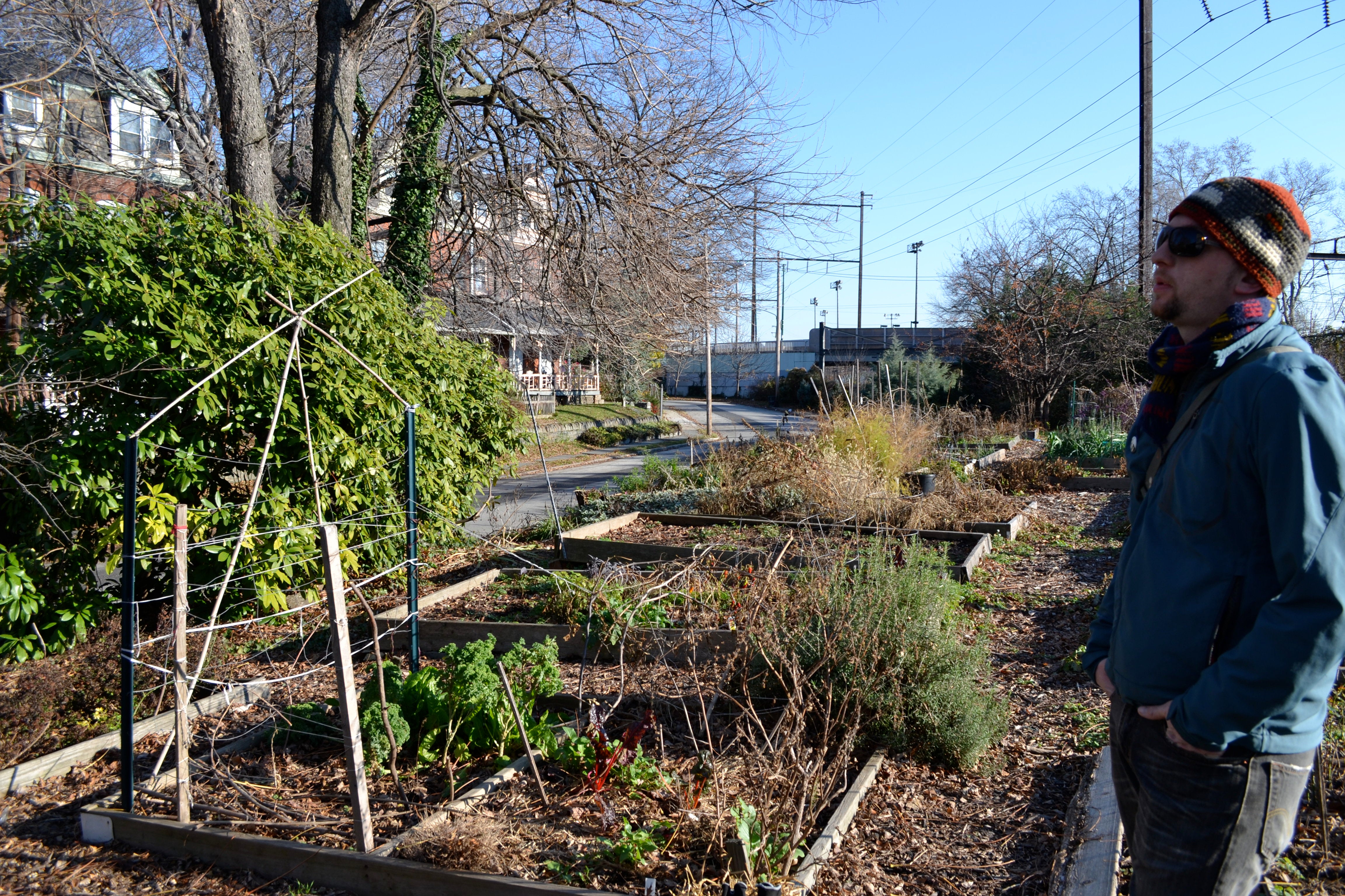 Trevor McElroy, who has been gardening at St. Bernard Community Garden for more than two years, is one of the members working to save the garden.