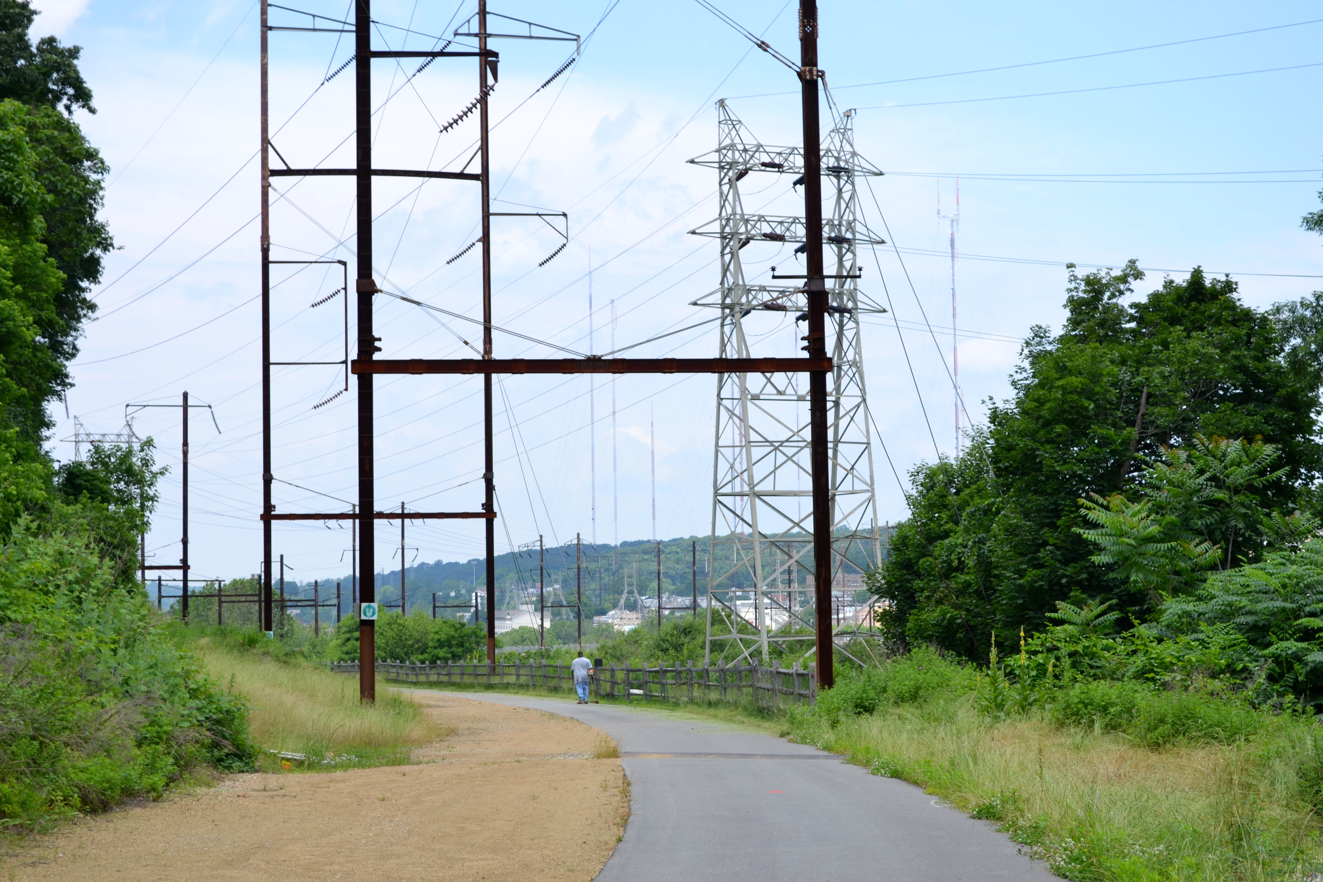 The dirt and paved trails meet just before the view opens to offer a view of Manayunk