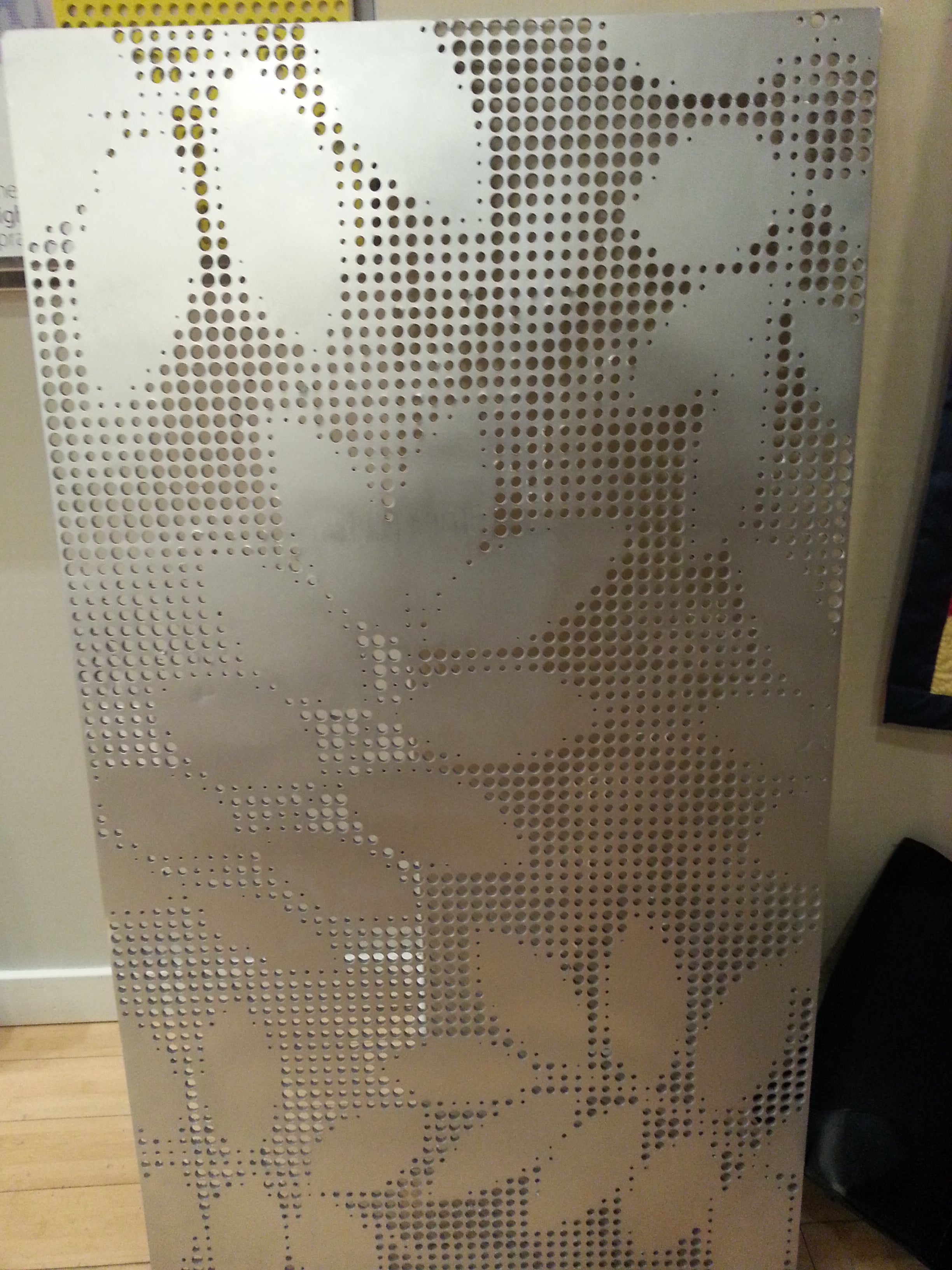A mock-up of the water jet-cut screen