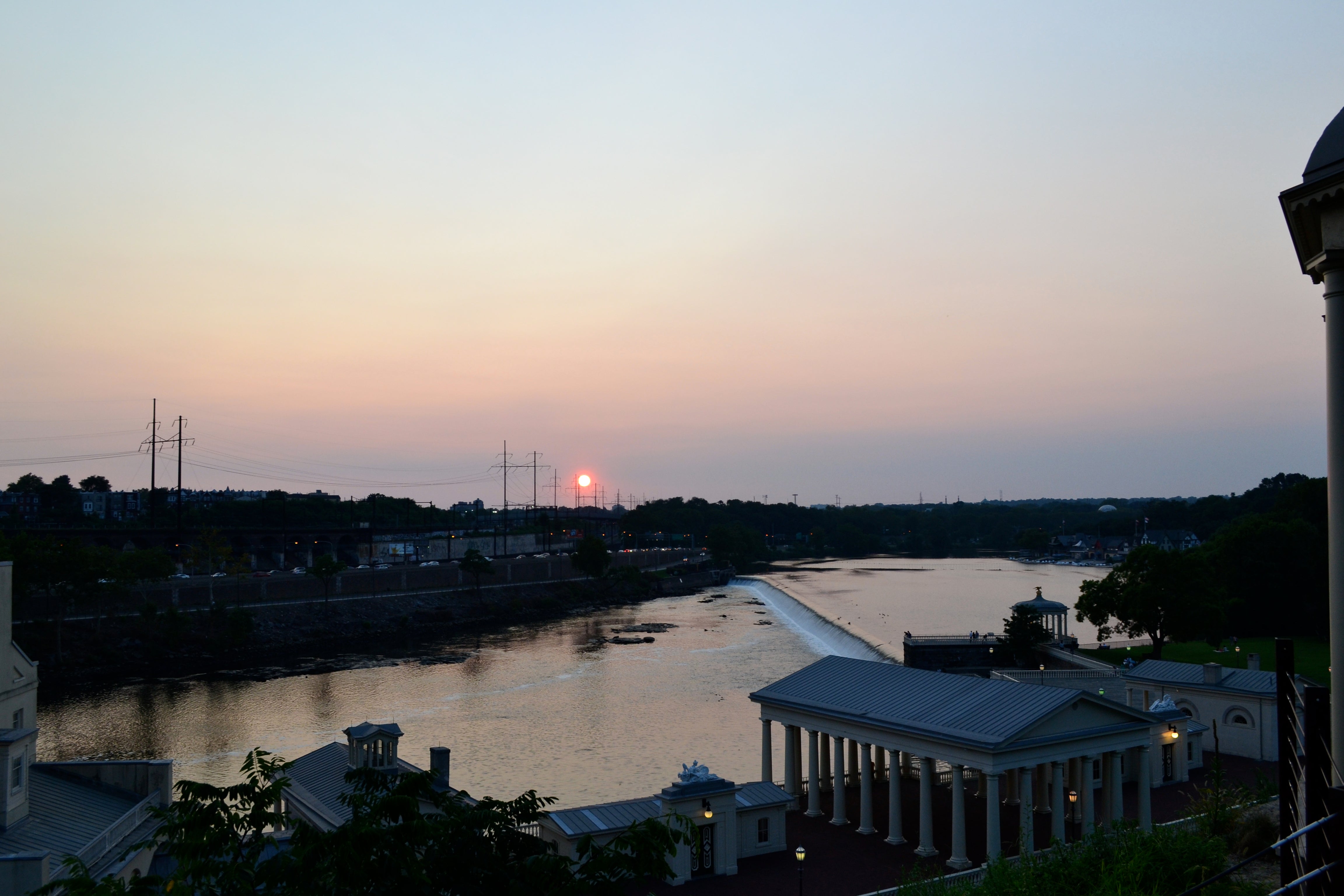 Back where it started, the tour watched the sun dip over the tree line from gazebos near the Art Museum