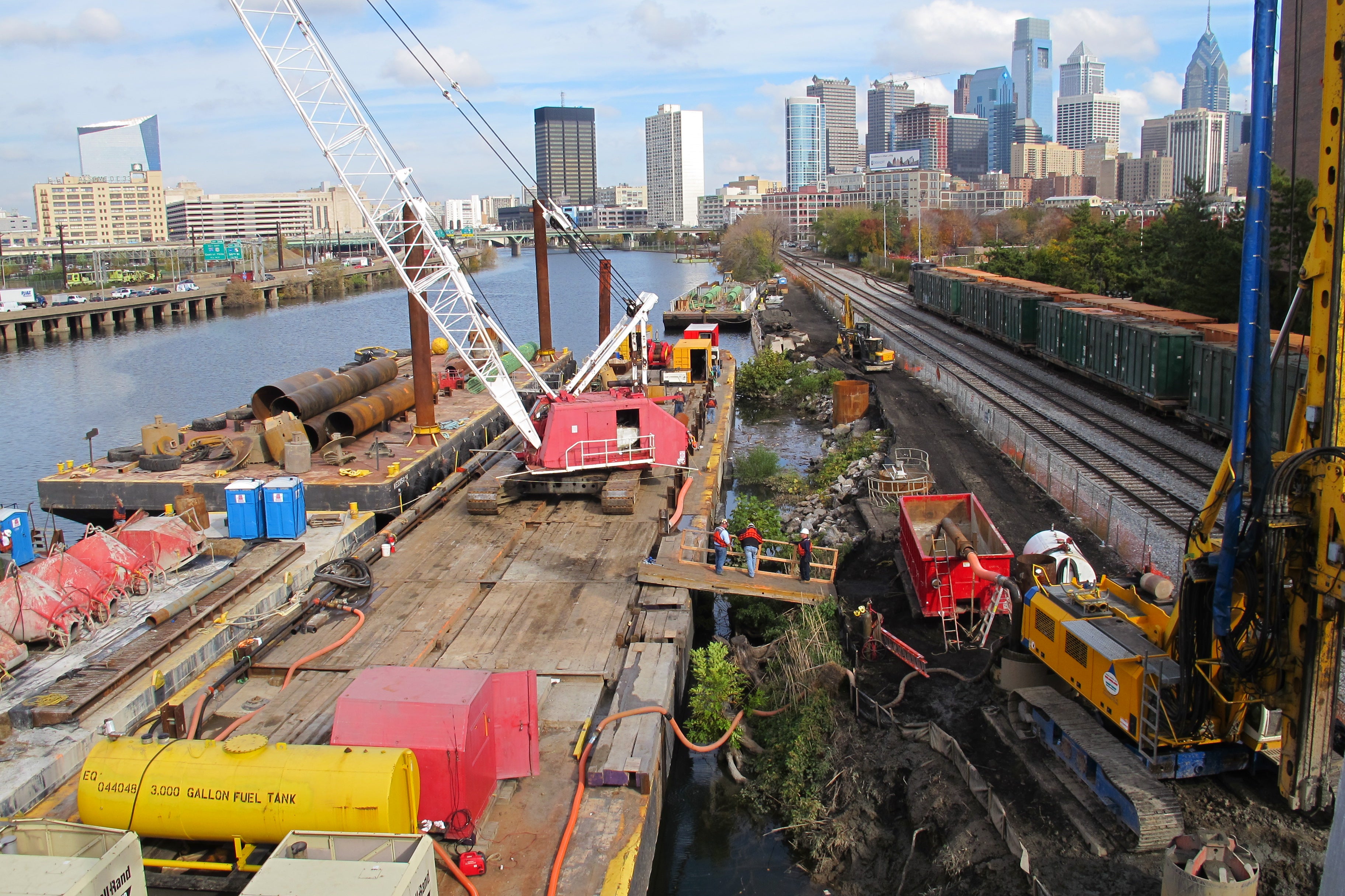 A section of boardwalk is under construction on the Schuylkill River to connect Schuylkill Banks to the South Street Bridge.