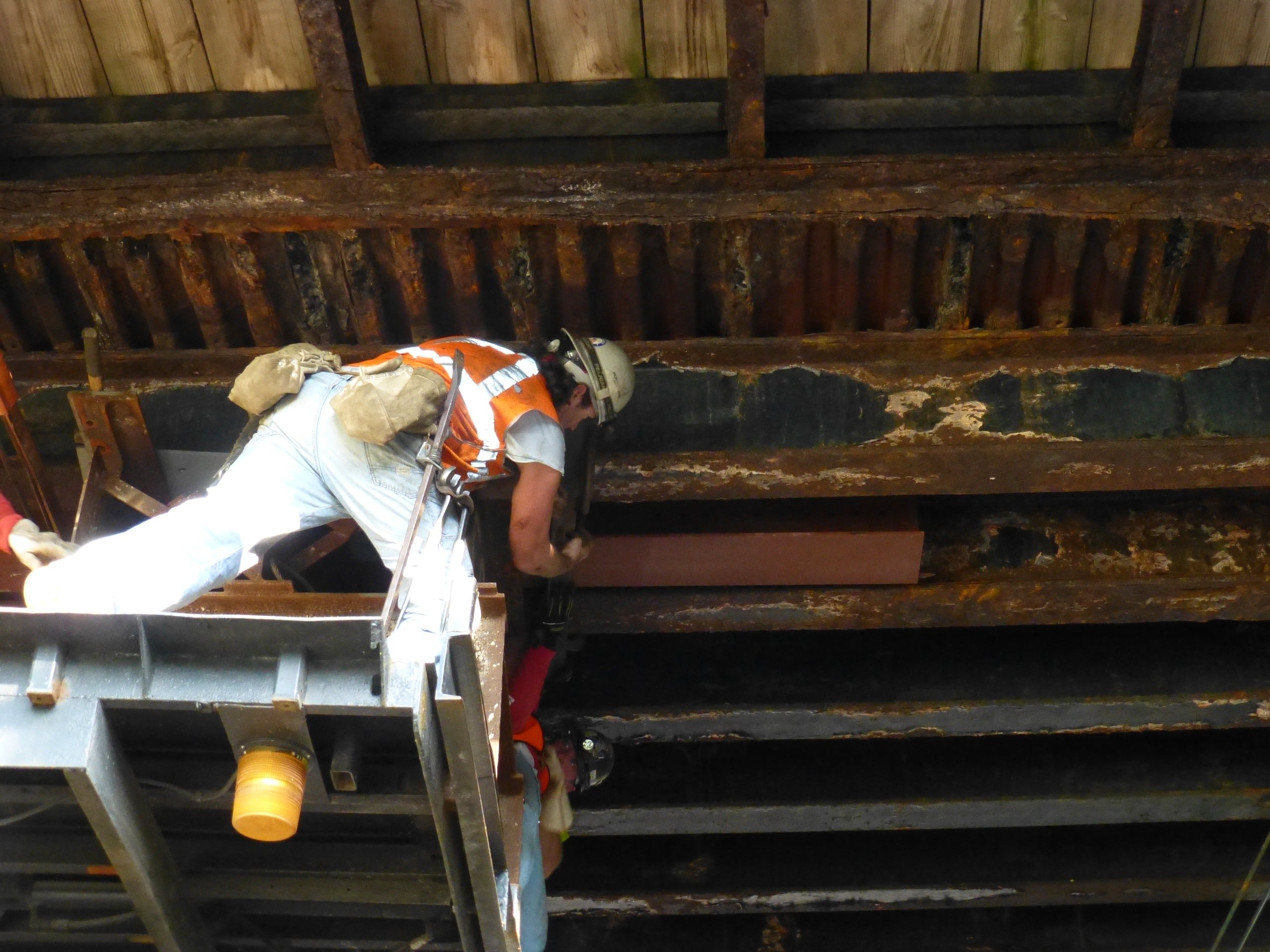 Crews slid eight new beams between existing supports, Photo courtesy of the Streets Department 